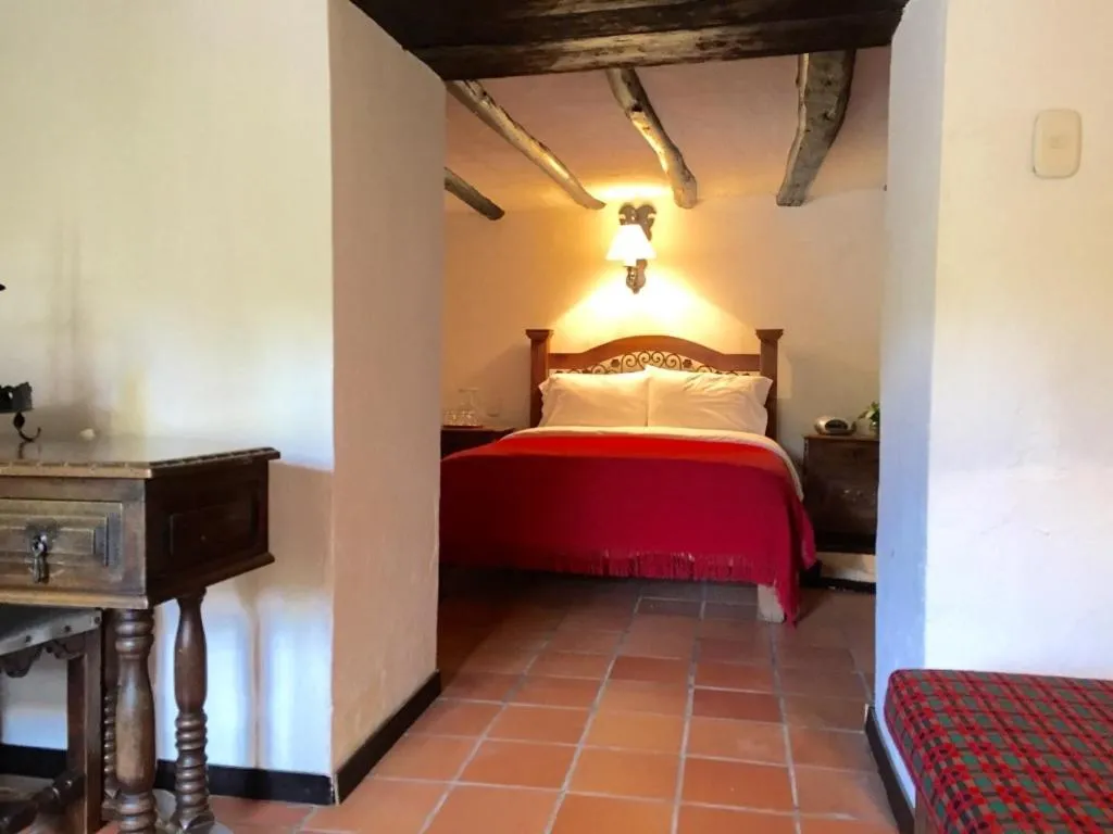 Photo of the whole room, Bed in Hotel San Luis de Ucuengá