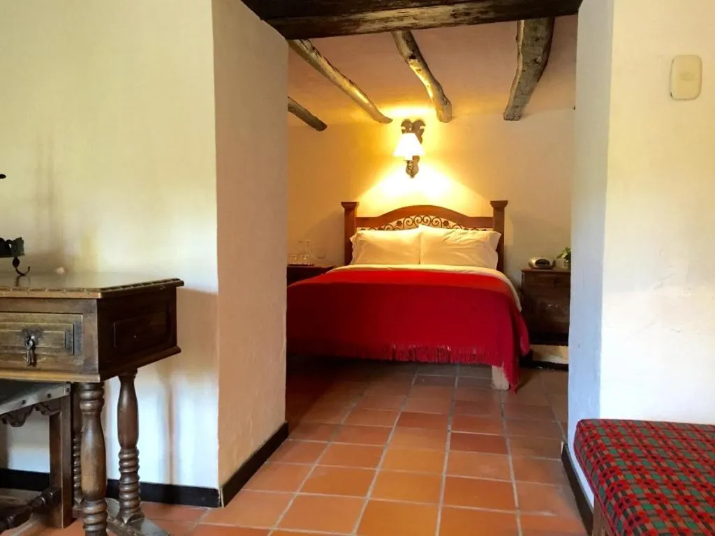 Photo of the whole room, Bed in Hotel San Luis de Ucuengá