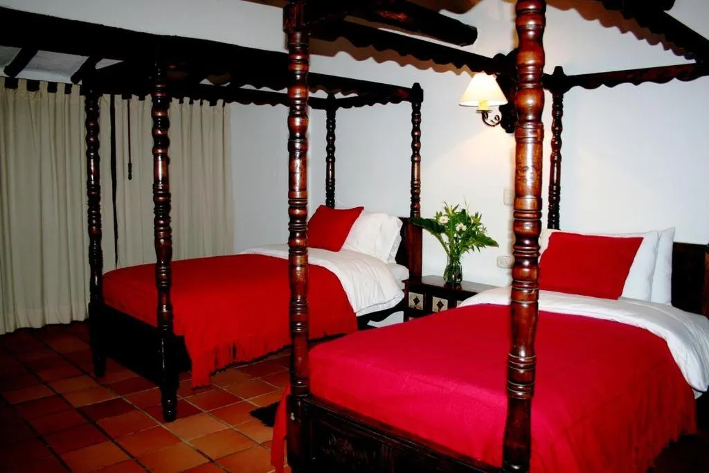 Bed in Hotel San Luis de Ucuengá