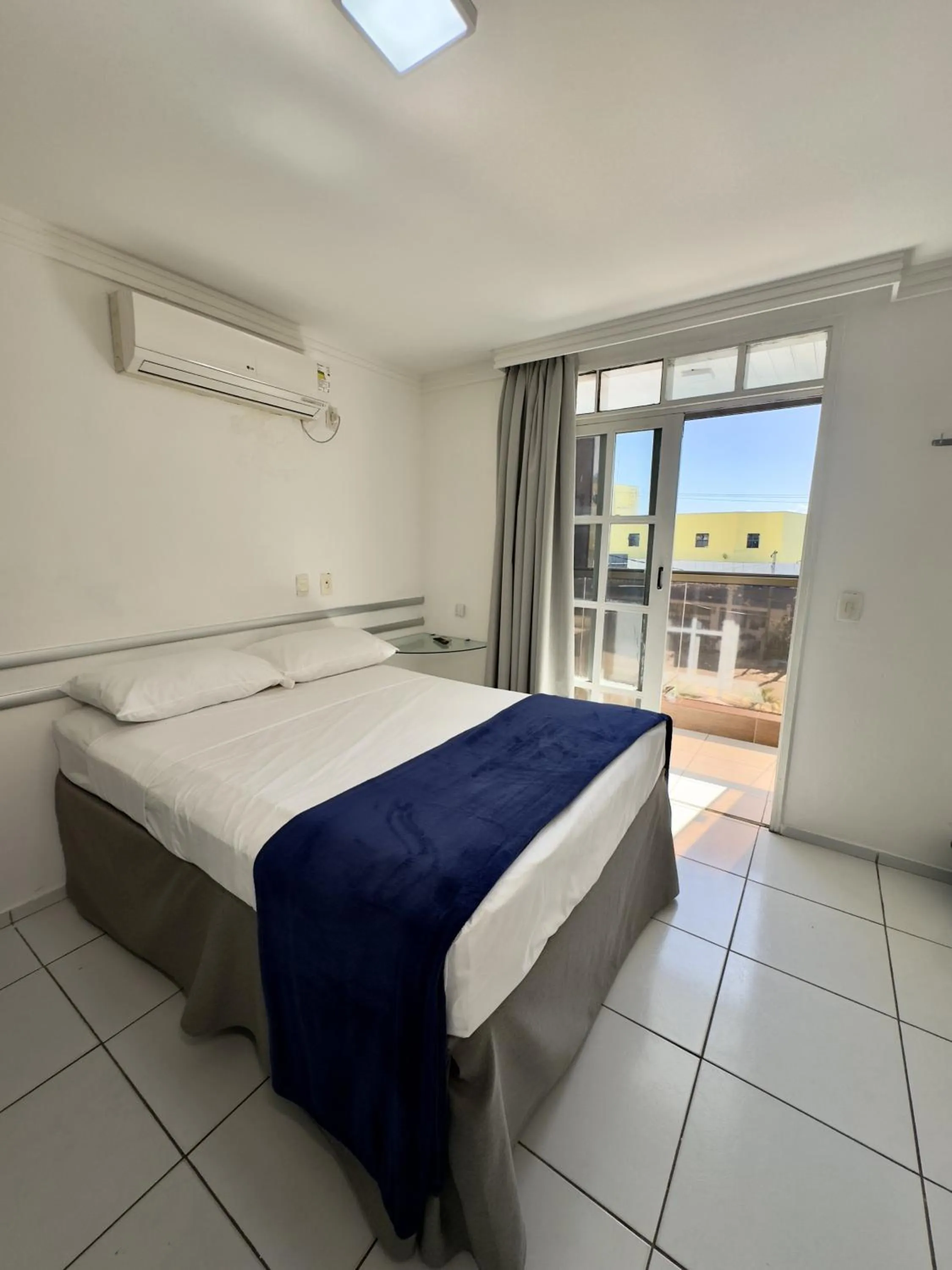 Bed in Las Brisas Beach Hotel