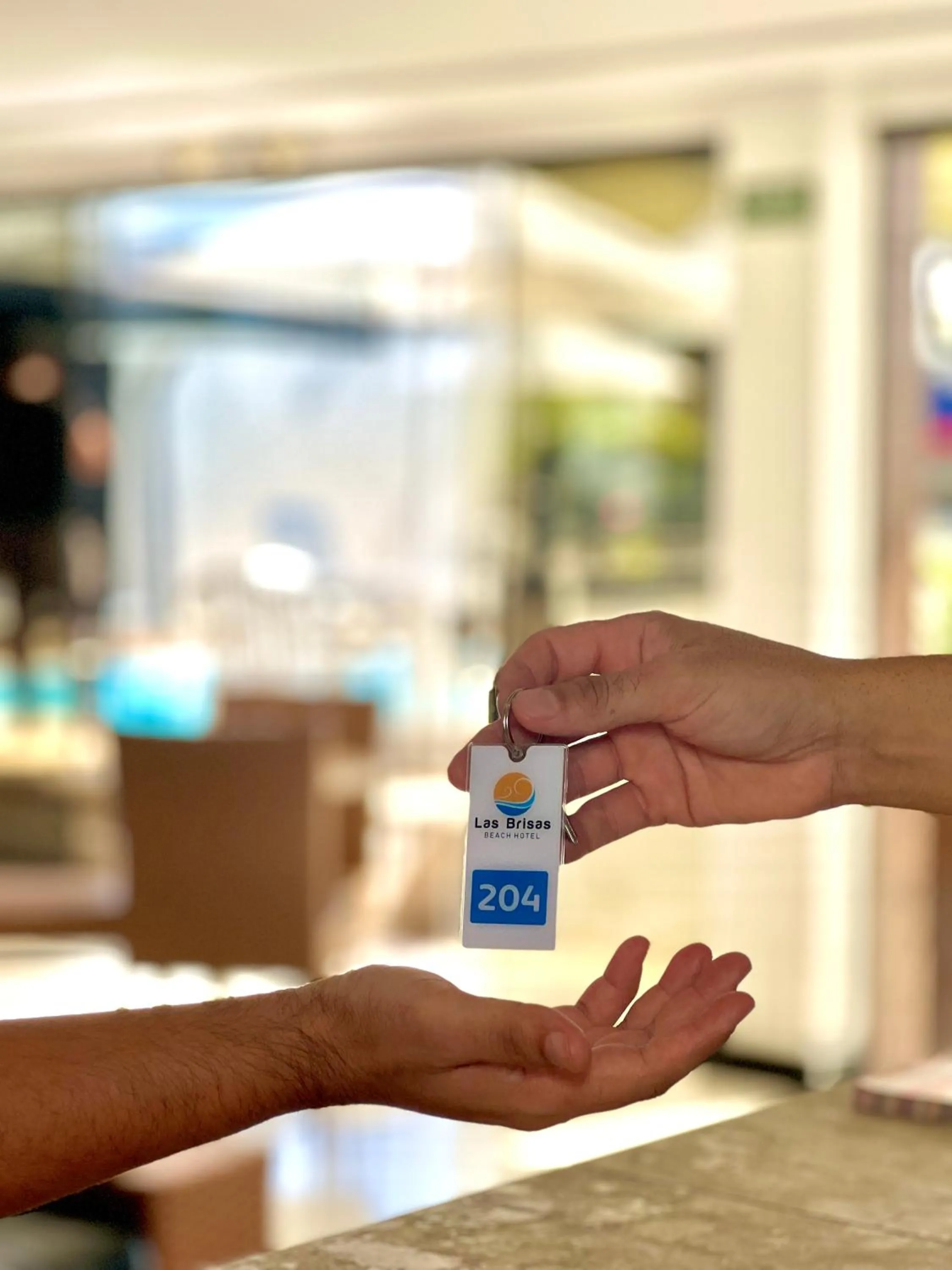 People in Las Brisas Beach Hotel