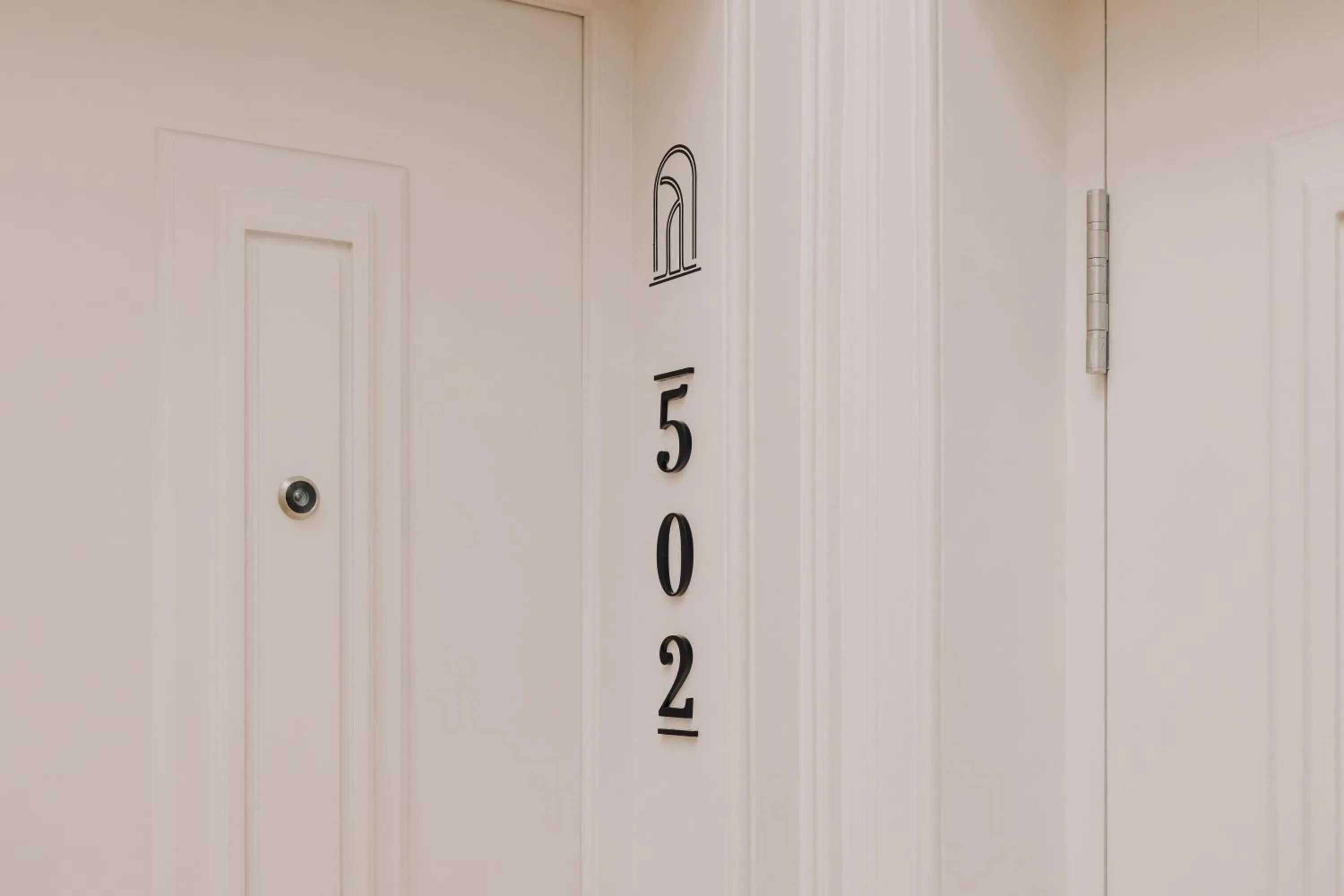 Property logo or sign in Ando Living - Madalena House