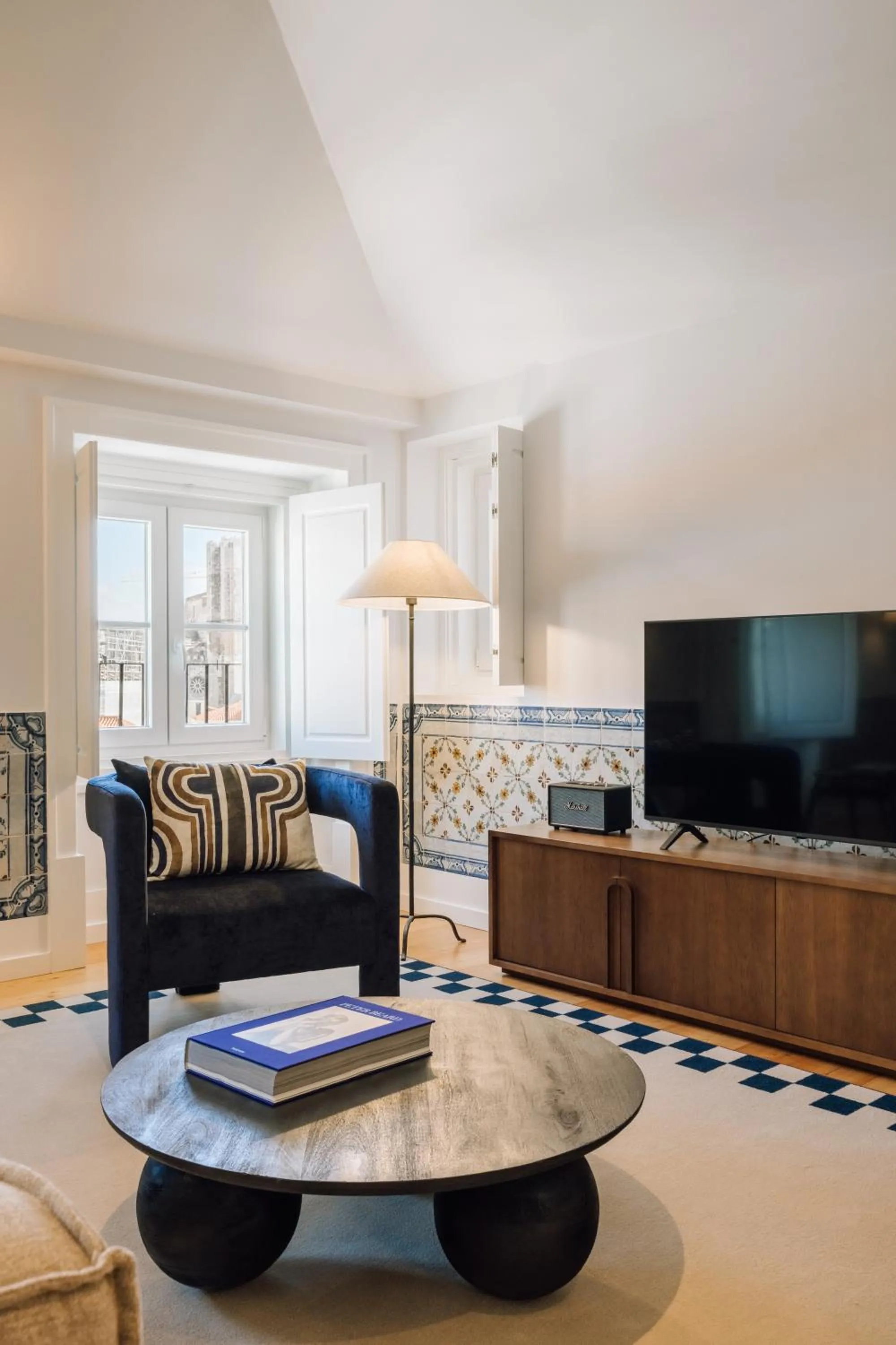 Communal lounge/ TV room in Ando Living - Madalena House