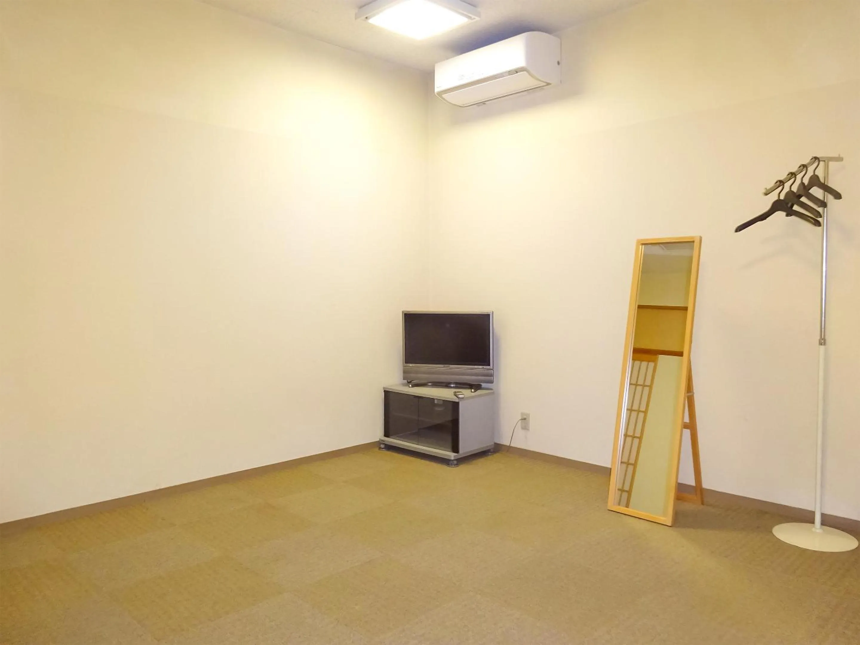 Photo of the whole room in Natural Onsen Hostel Hidamari no Yu