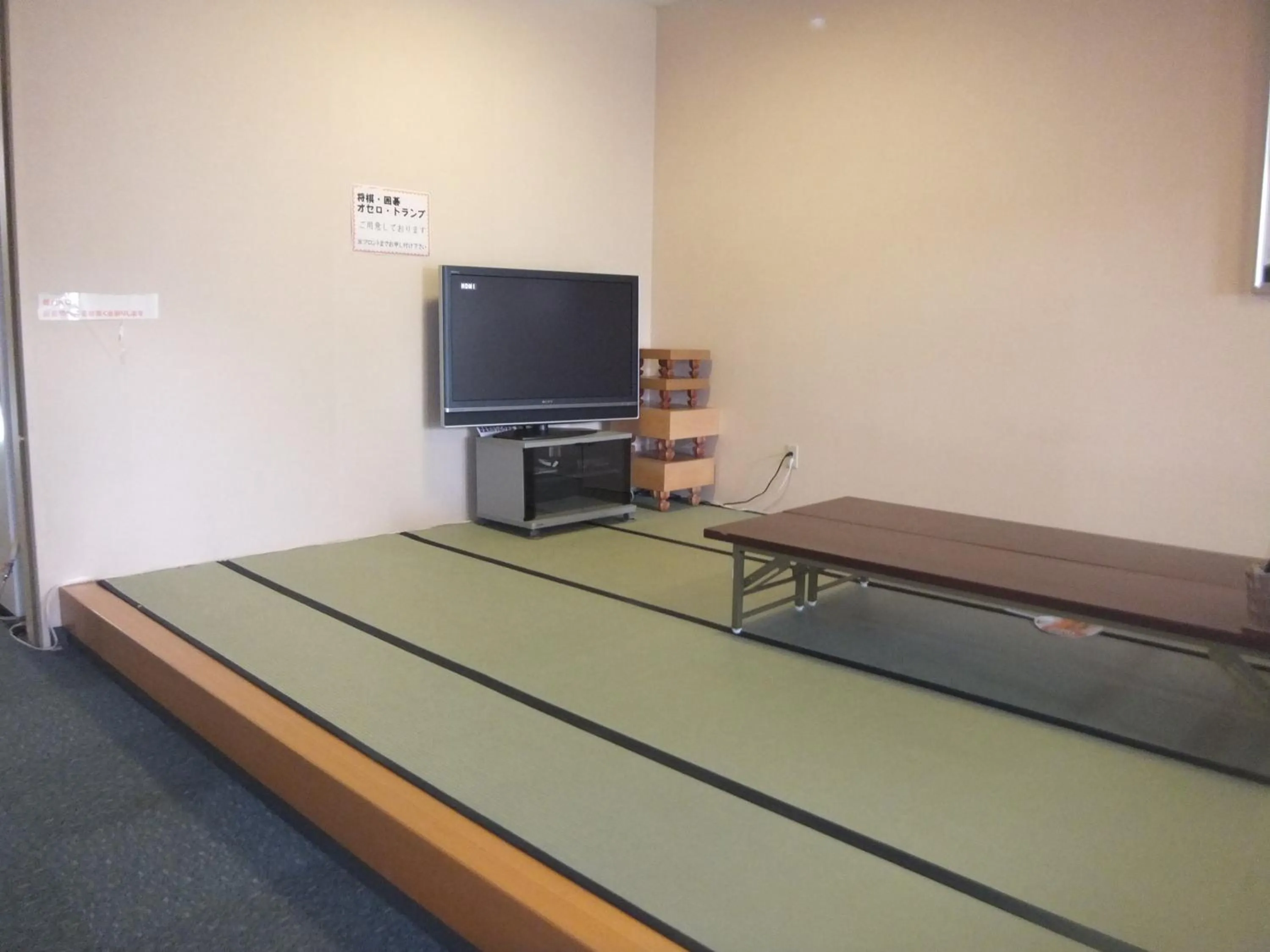 Communal lounge/ TV room in Natural Onsen Hostel Hidamari no Yu