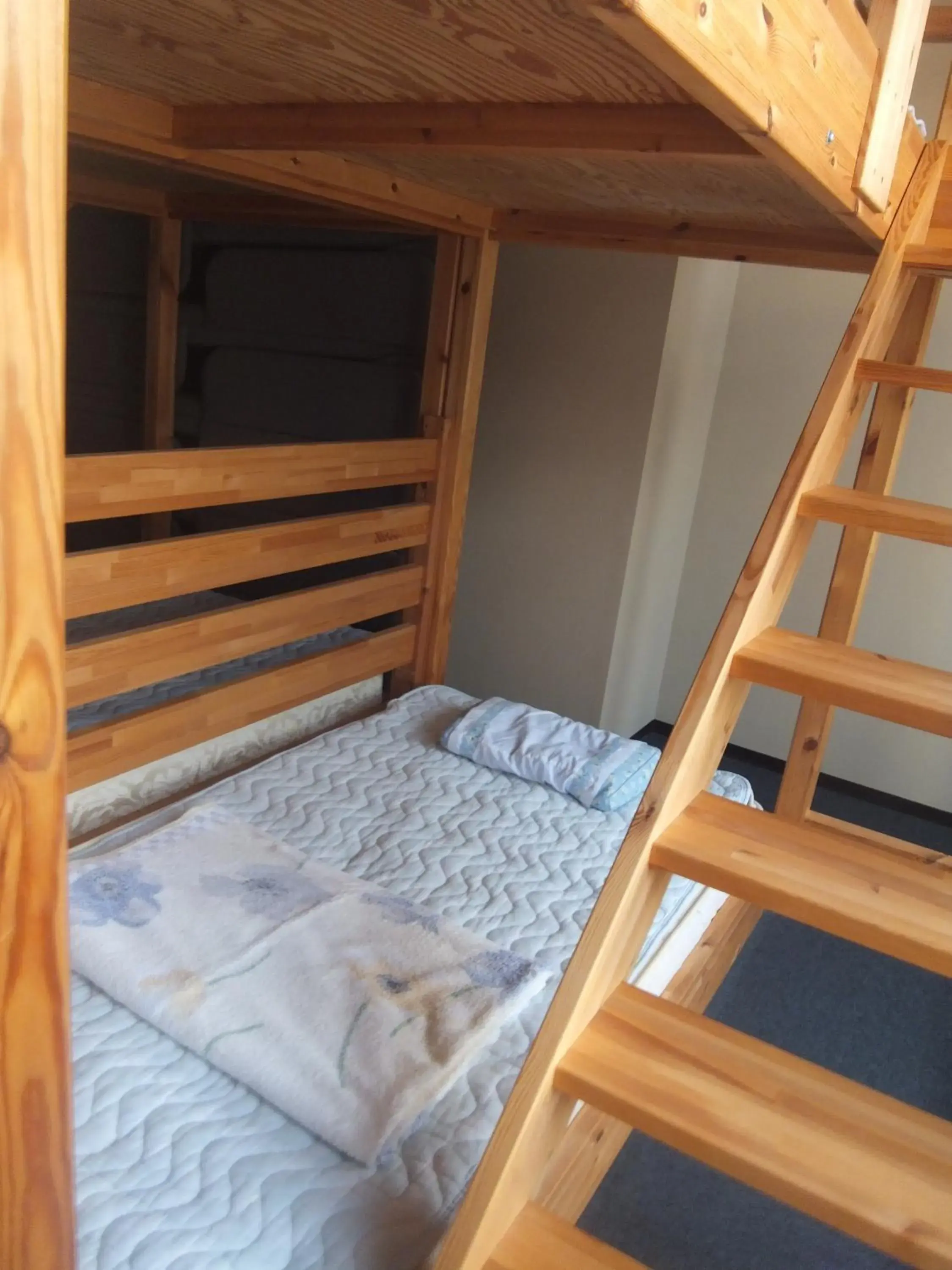 Bunk Bed in Mixed Dormitory Room in Natural Onsen Hostel Hidamari no Yu Bunk Bed in Mixed Dormitory Room in Natural Onsen Hostel Hidamari no Yu