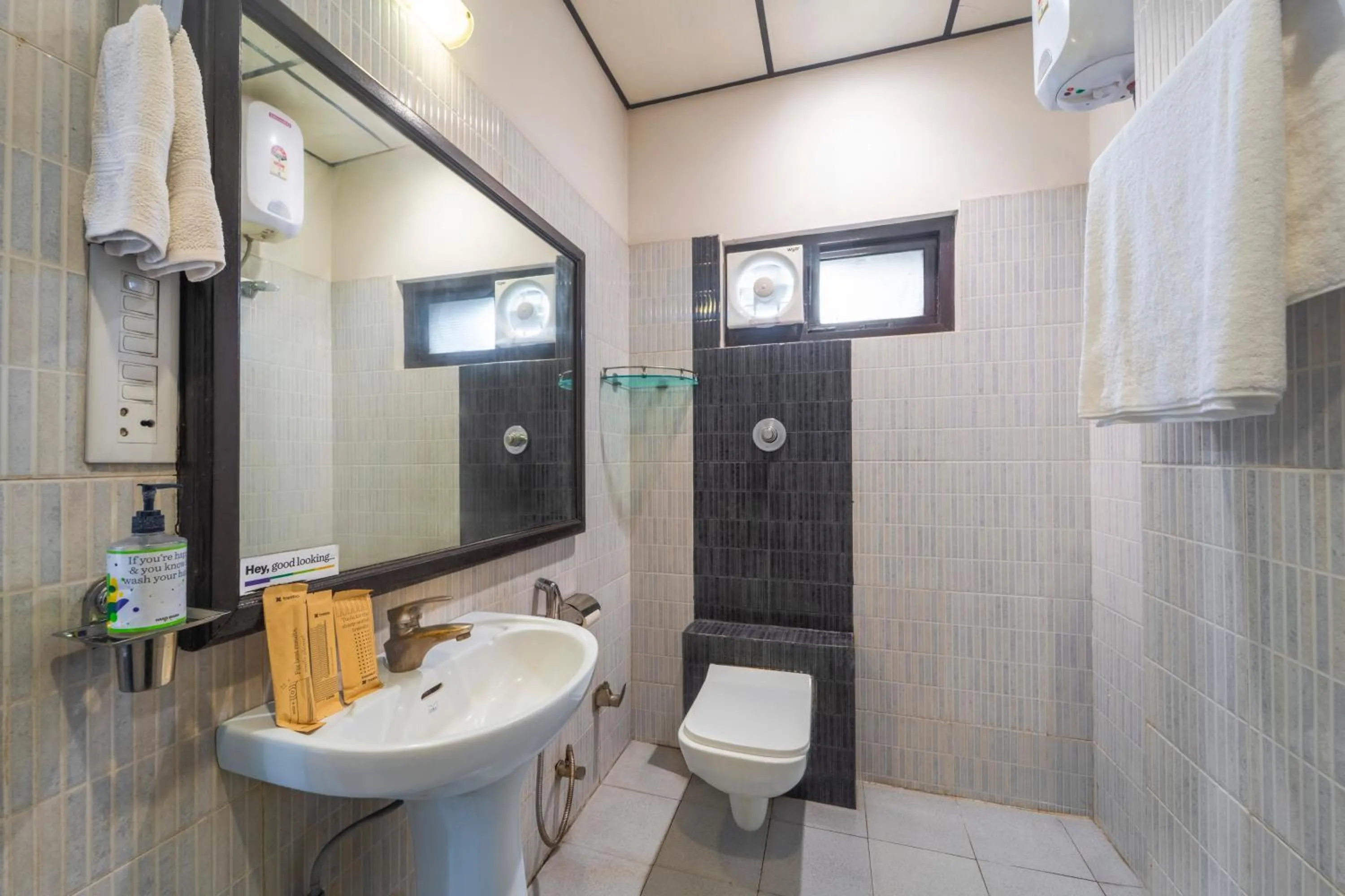 Bathroom in Treebo Shivam Inn Near Singapore Mall