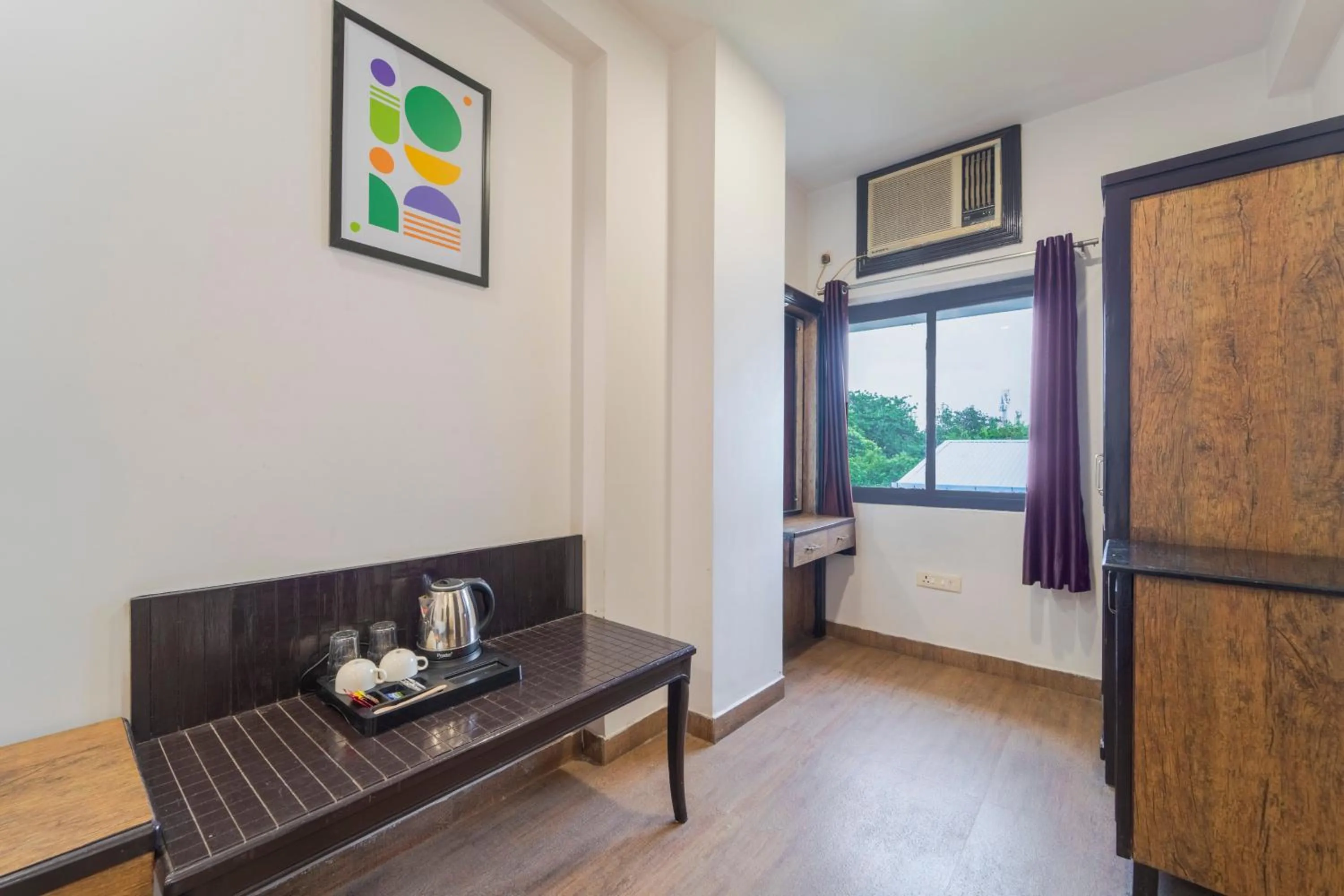 Bedroom in Treebo Shivam Inn Near Singapore Mall