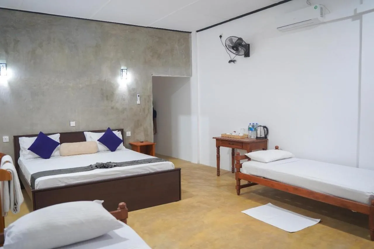 Bed in Sigiriya Cottage