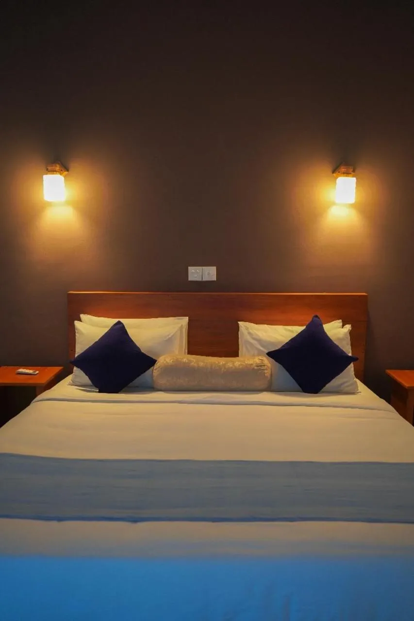 Bed in Sigiriya Cottage