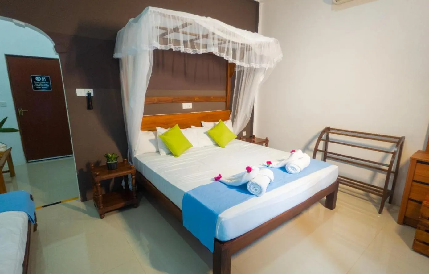 Bed in Sigiriya Cottage