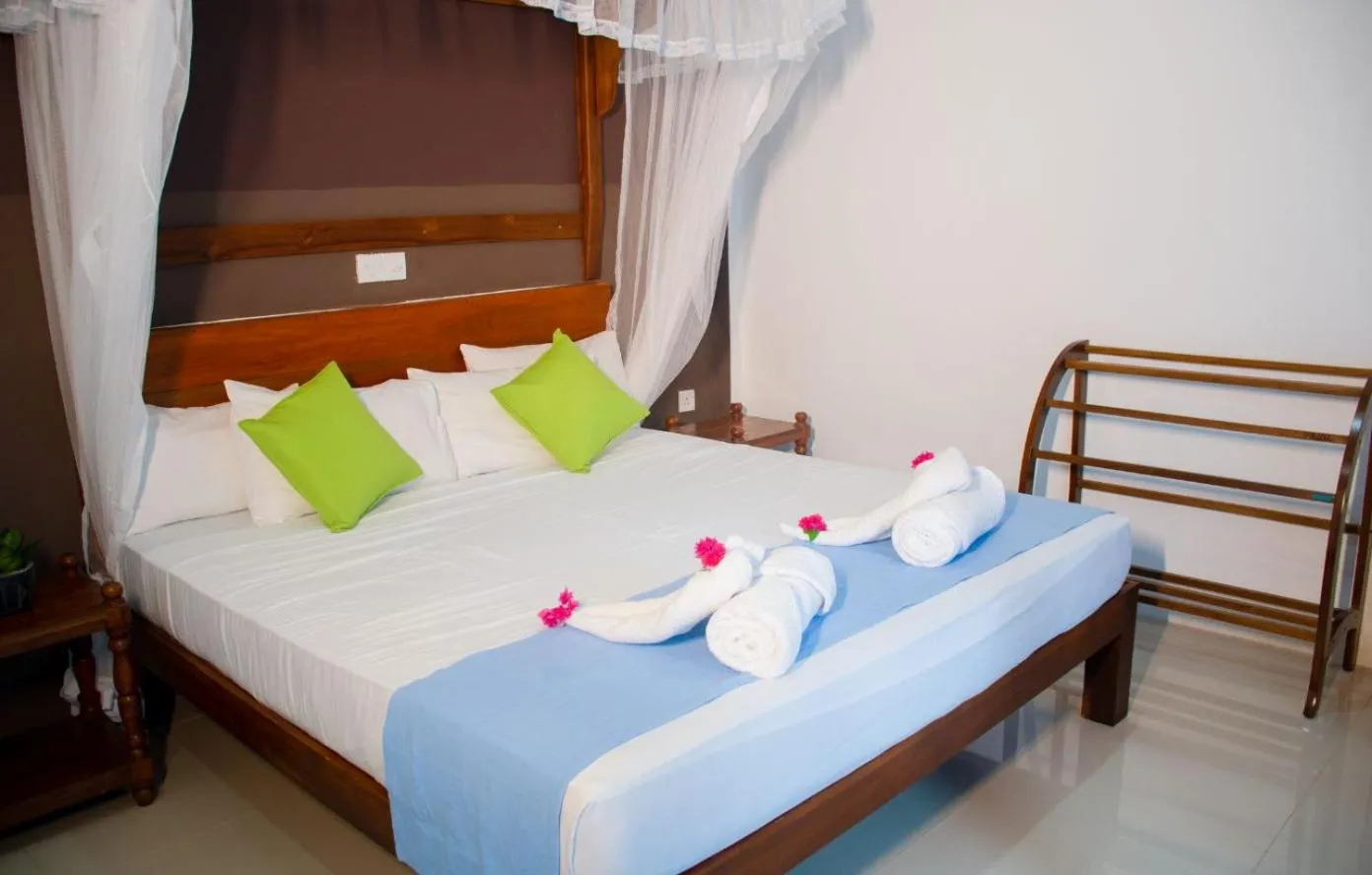 Bed in Sigiriya Cottage