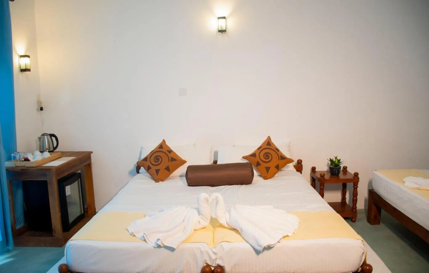 Bed in Sigiriya Cottage