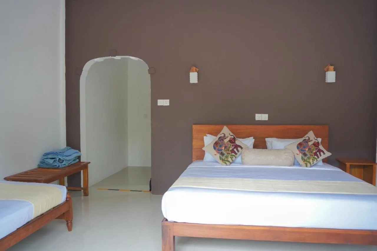Bed in Sigiriya Cottage