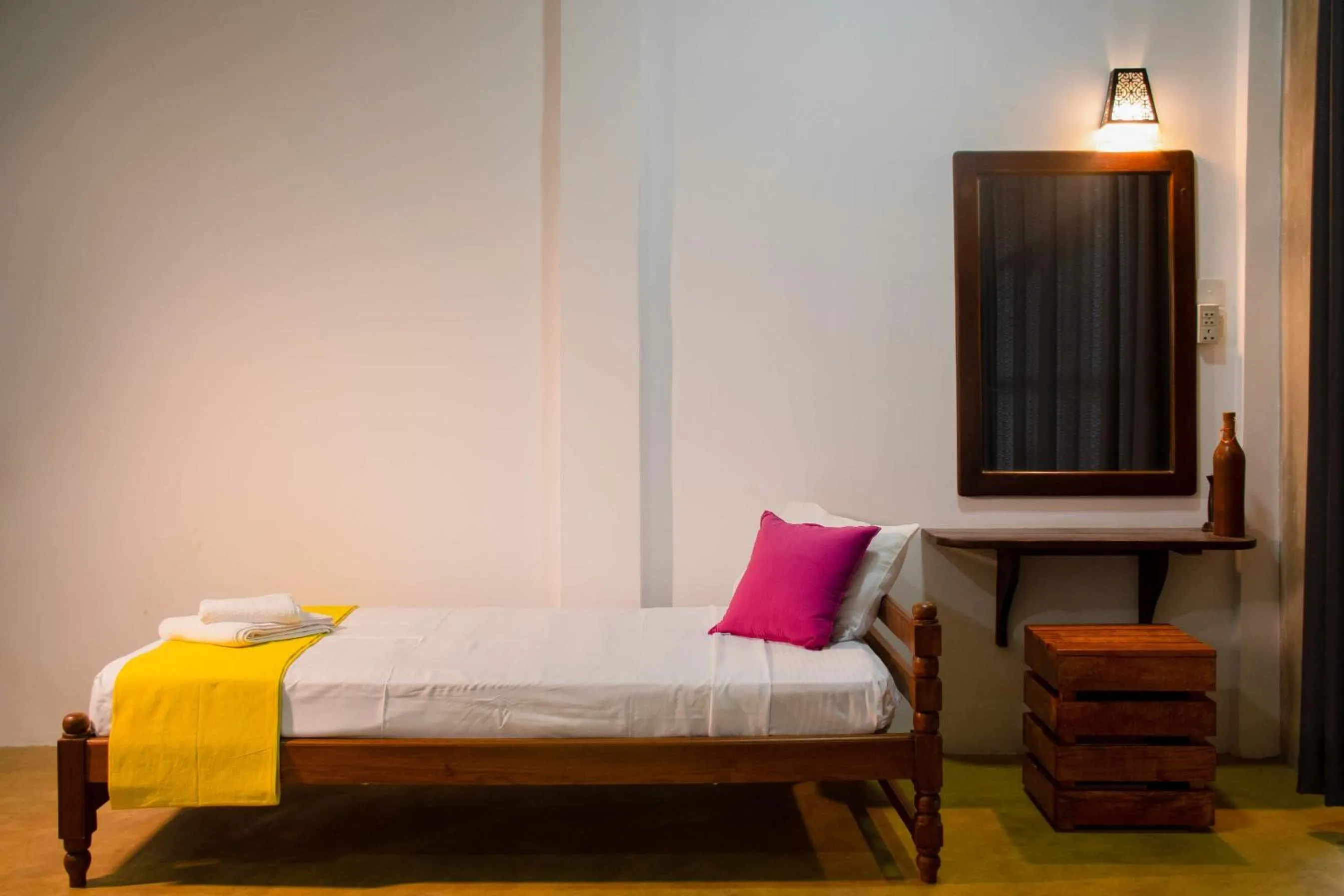 Bed in Sigiriya Cottage