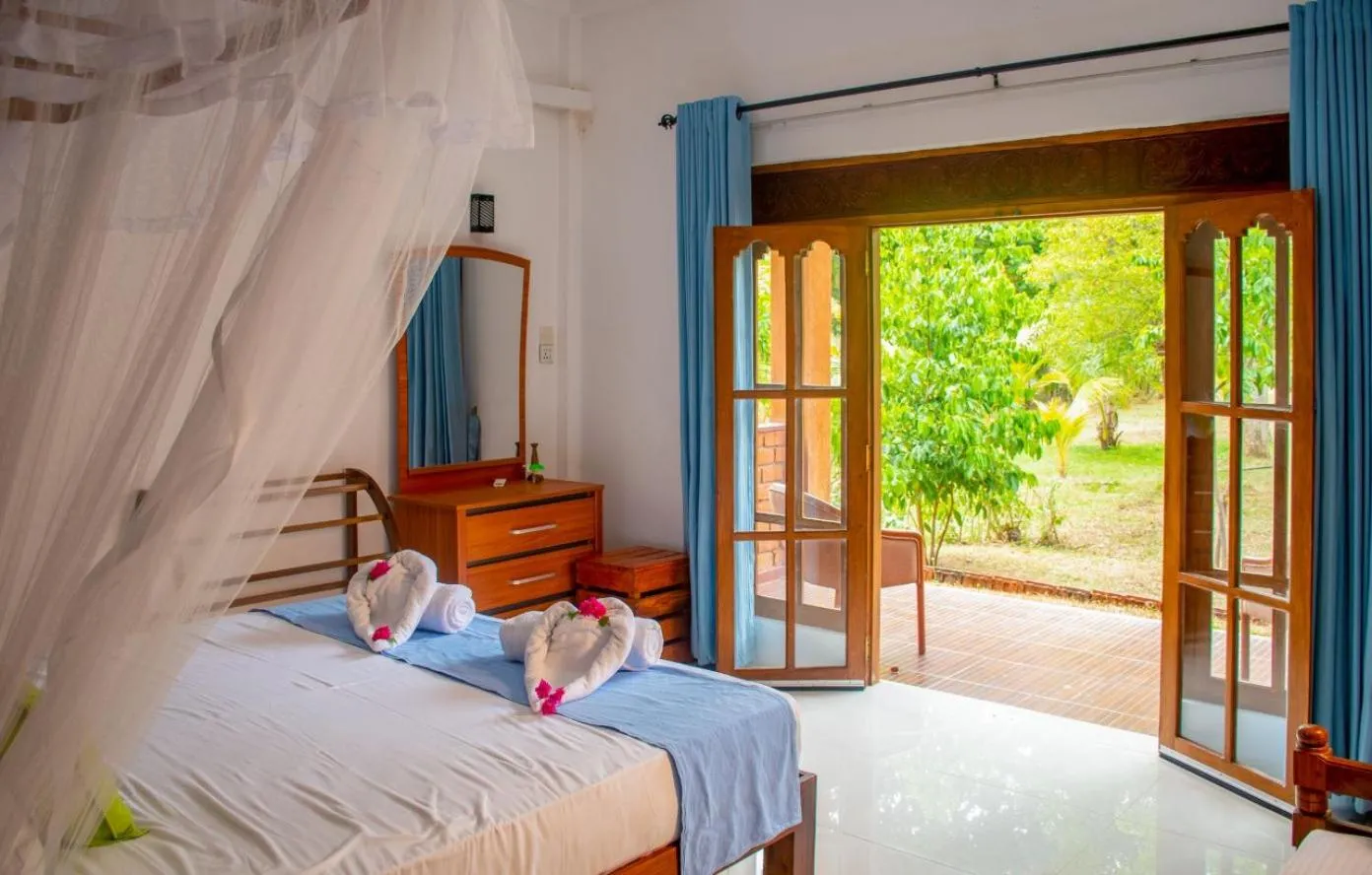 Bed in Sigiriya Cottage