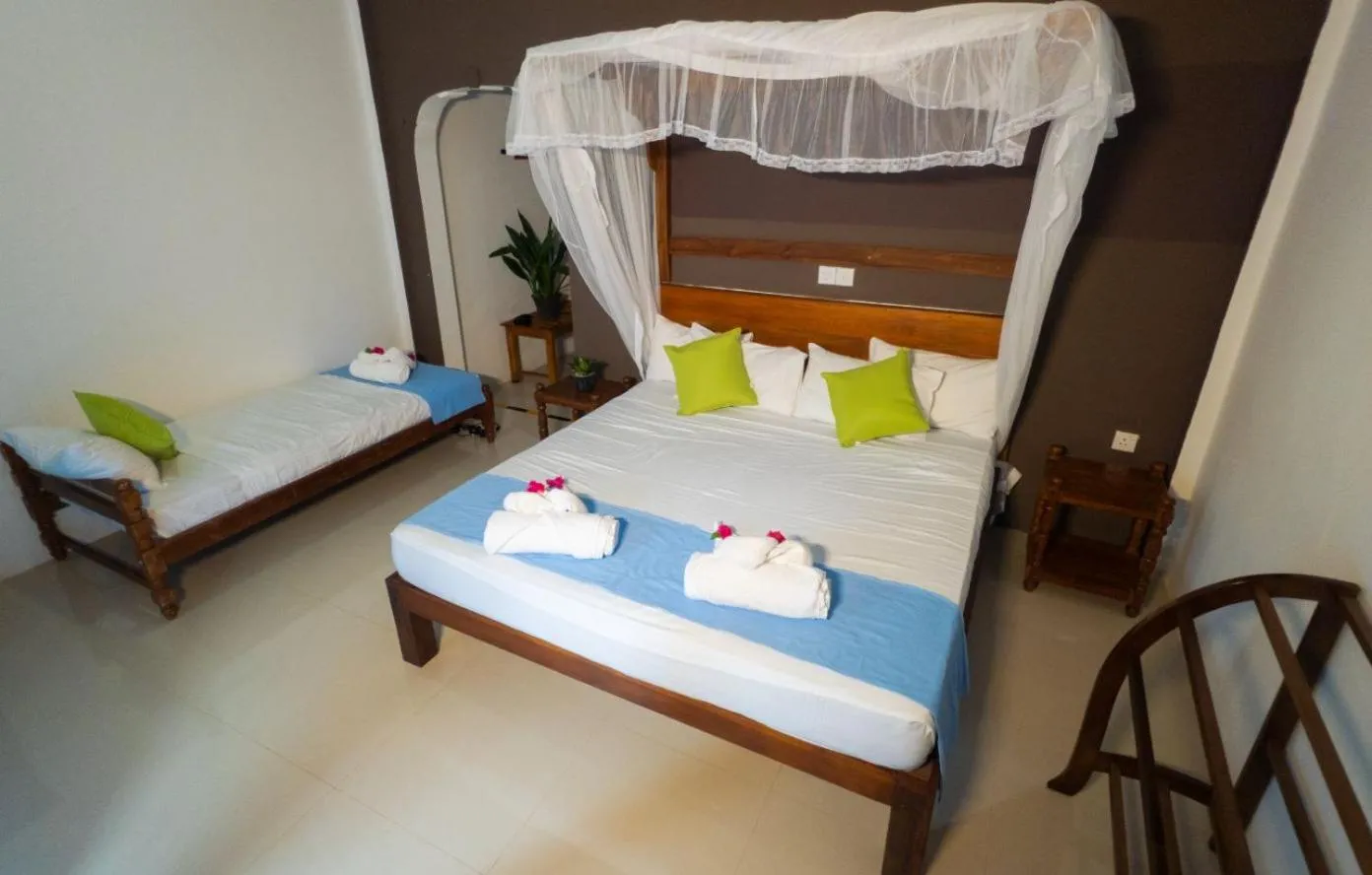 Bed in Sigiriya Cottage