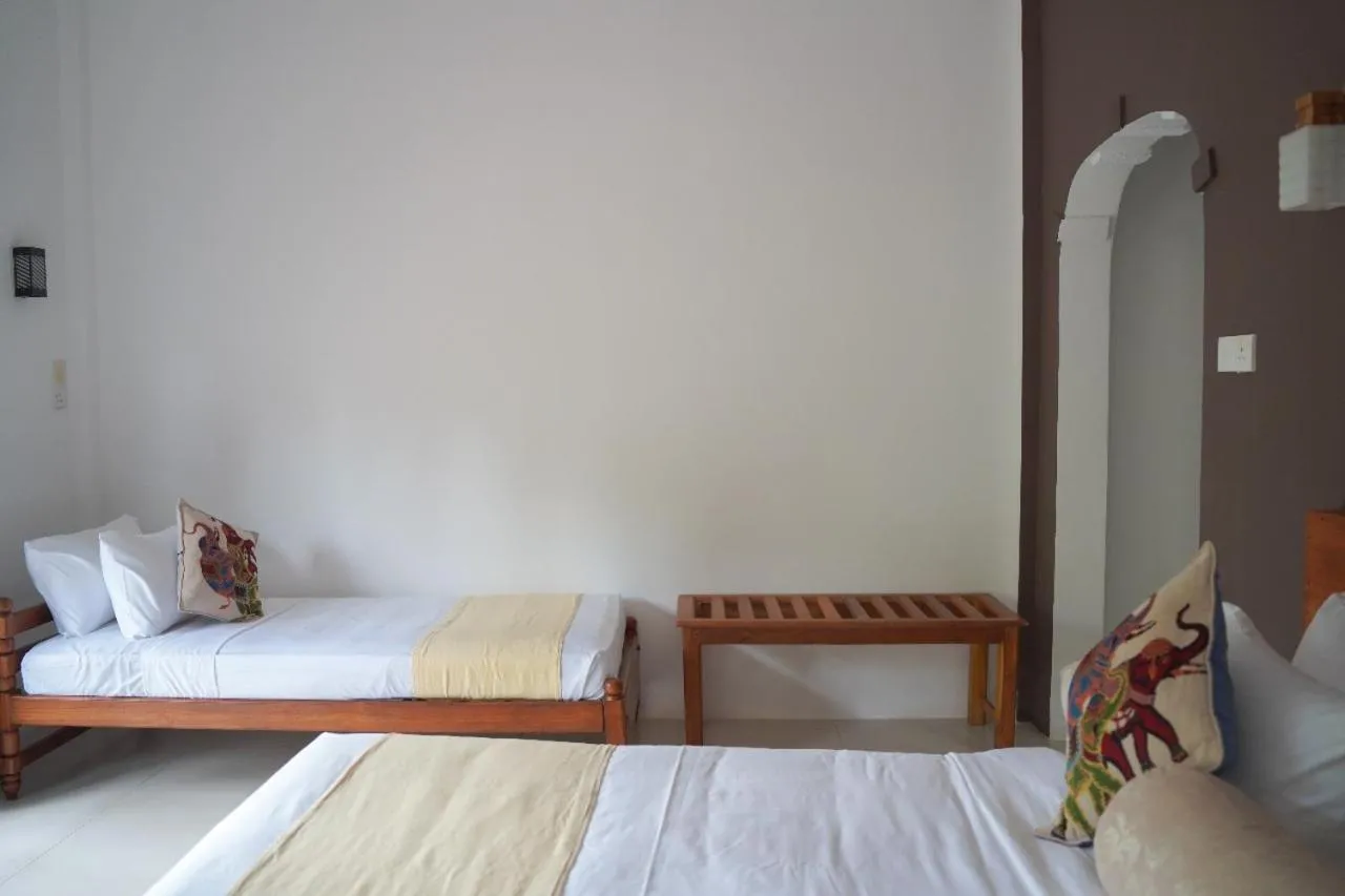 Bed in Sigiriya Cottage