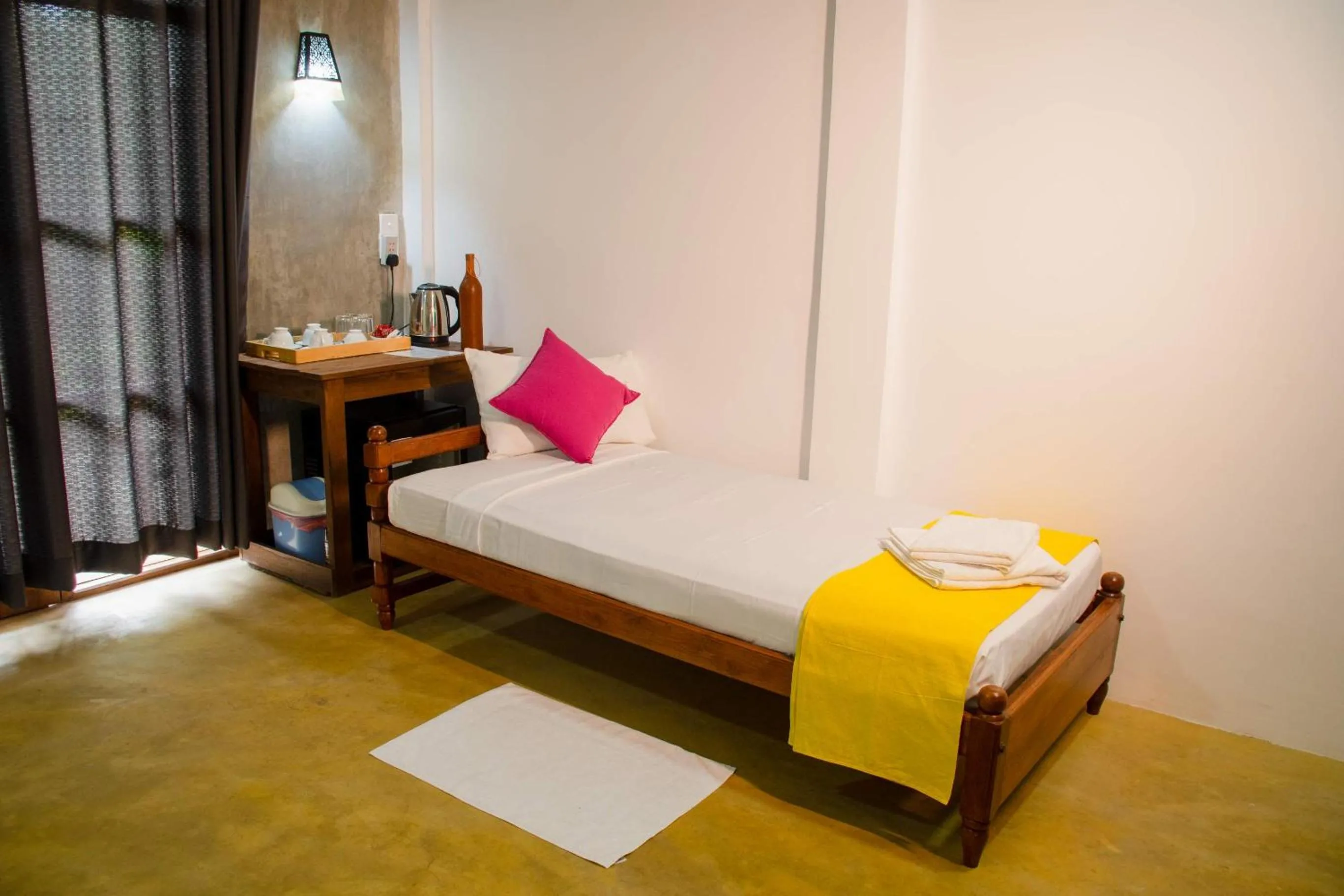 Bed in Sigiriya Cottage