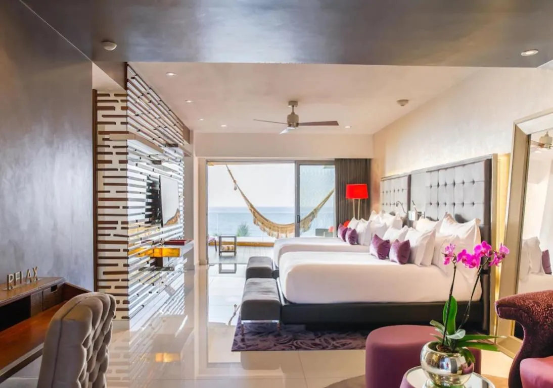 Bed in GARZA BLANCA PRESERVE RESORT & SPA