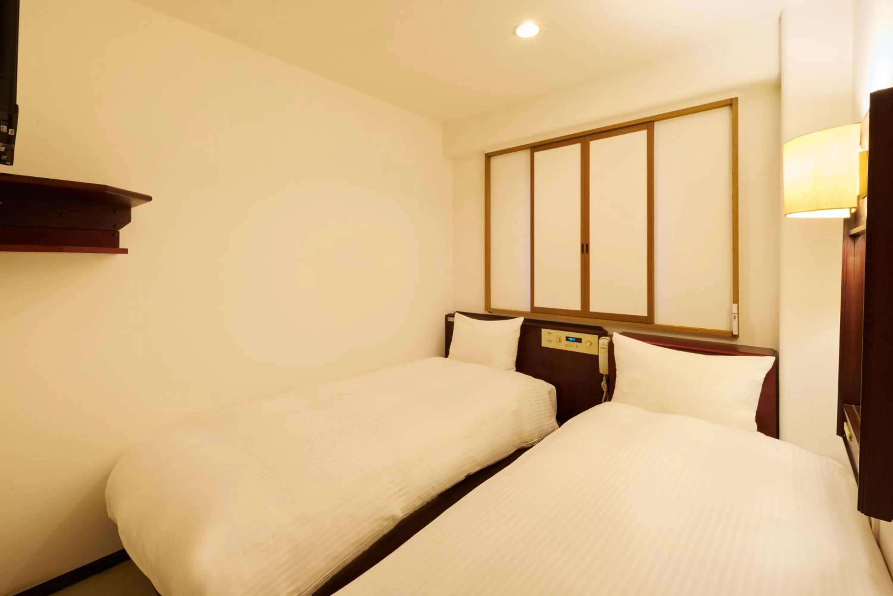 Photo of the whole room, Bed in Centurion Hotel Hamamatsu
