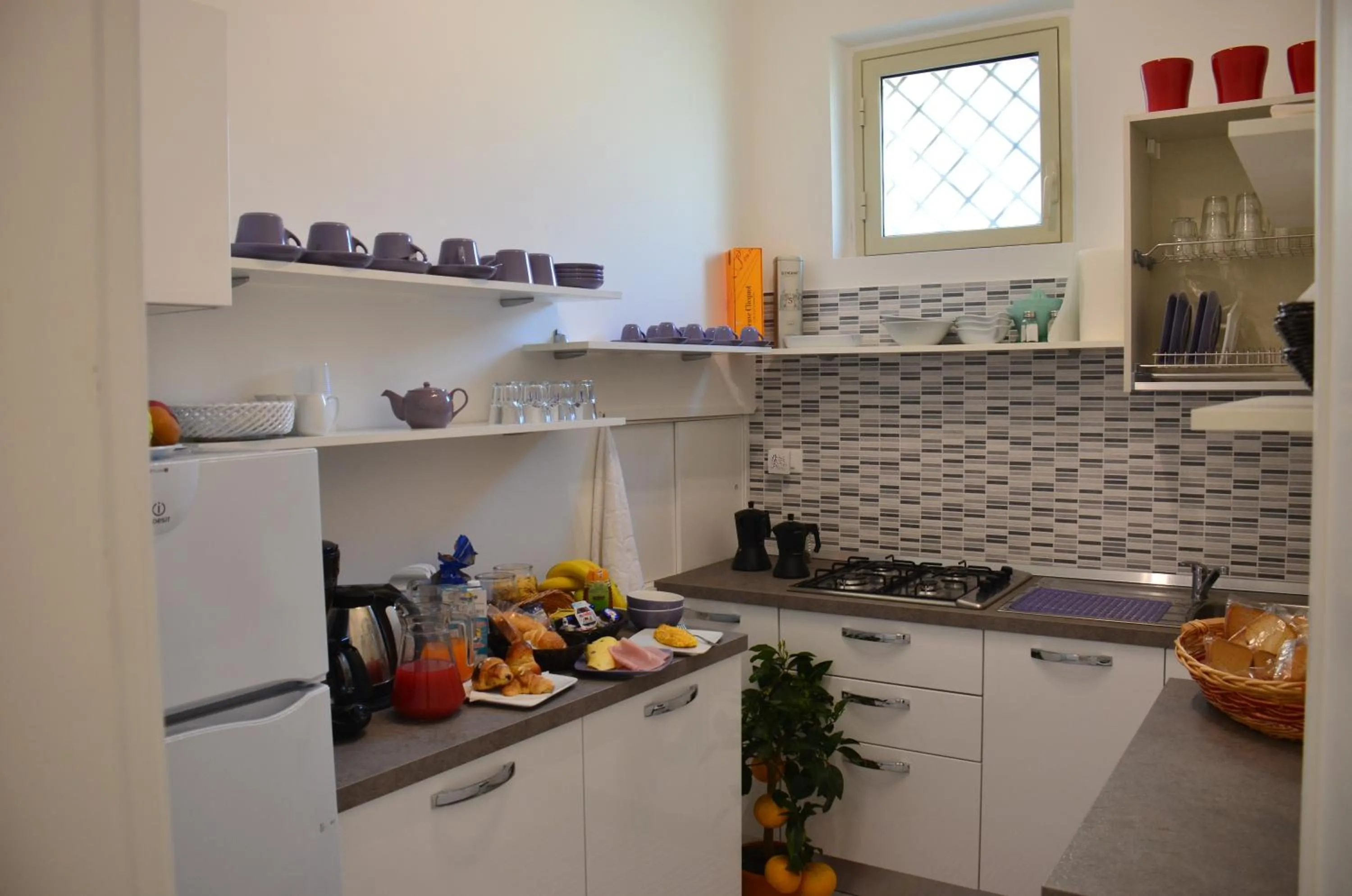 Kitchen or kitchenette in Athena Charming Rooms