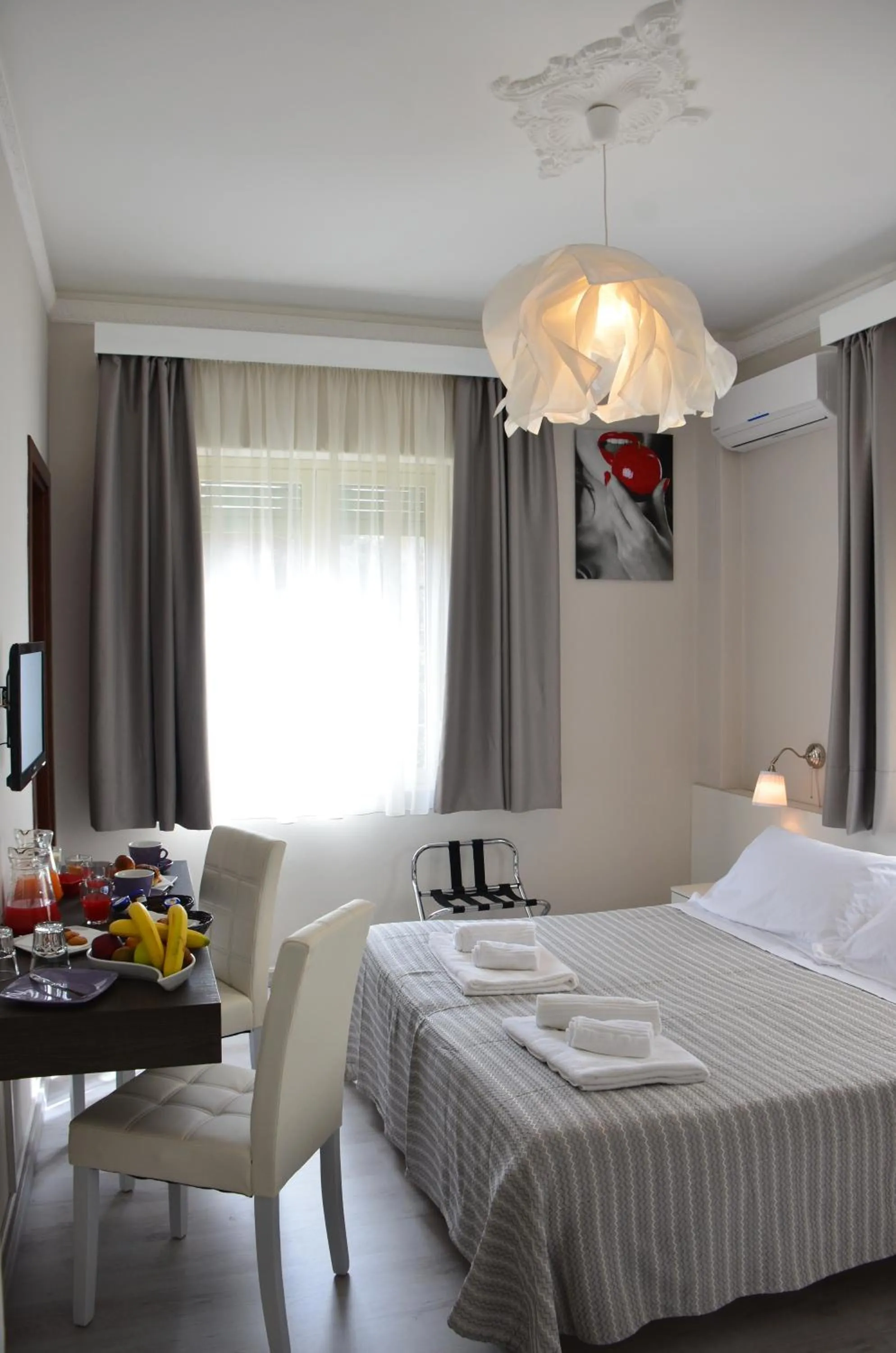 Bed in Athena Charming Rooms