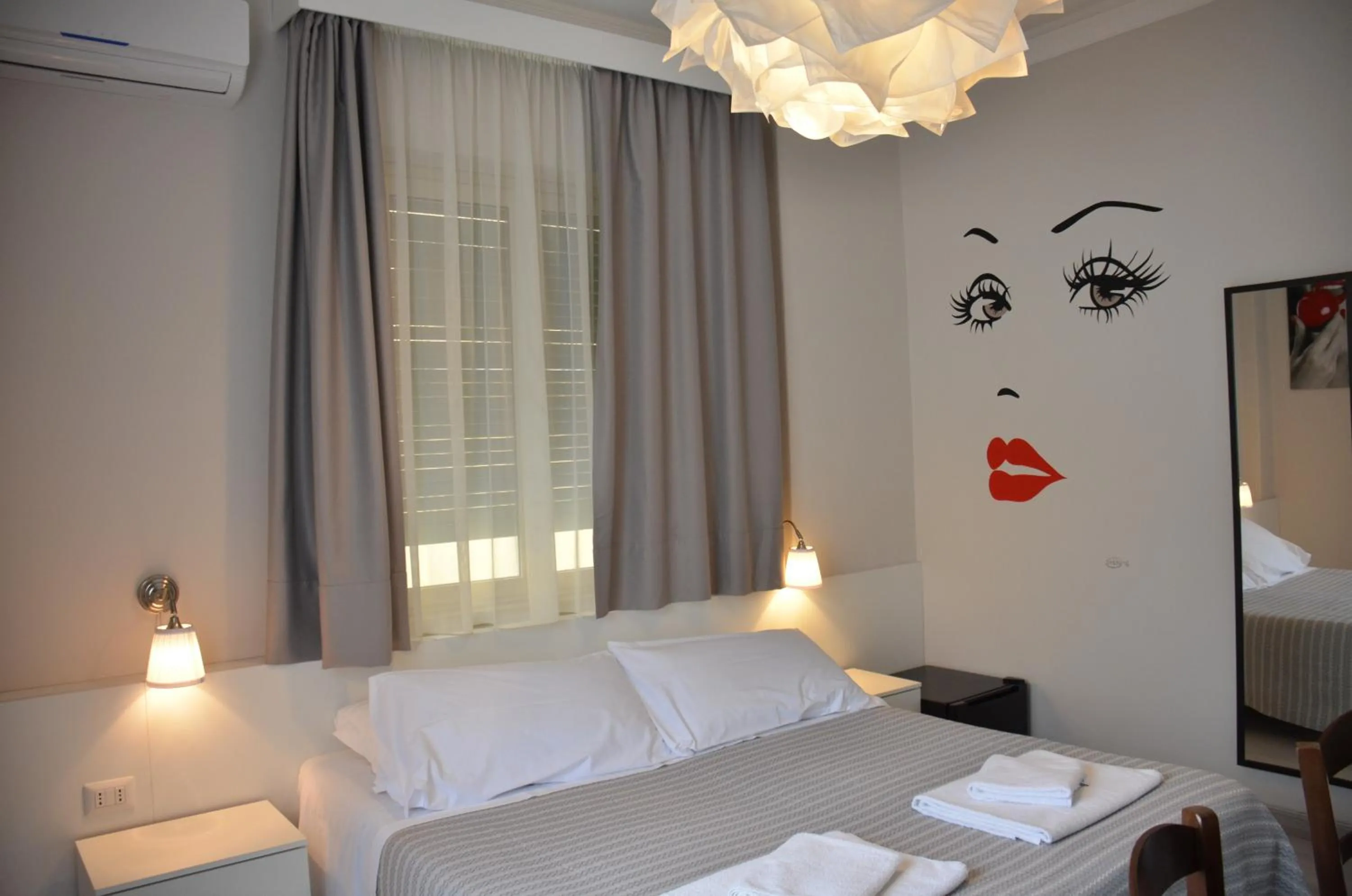 Bed in Athena Charming Rooms