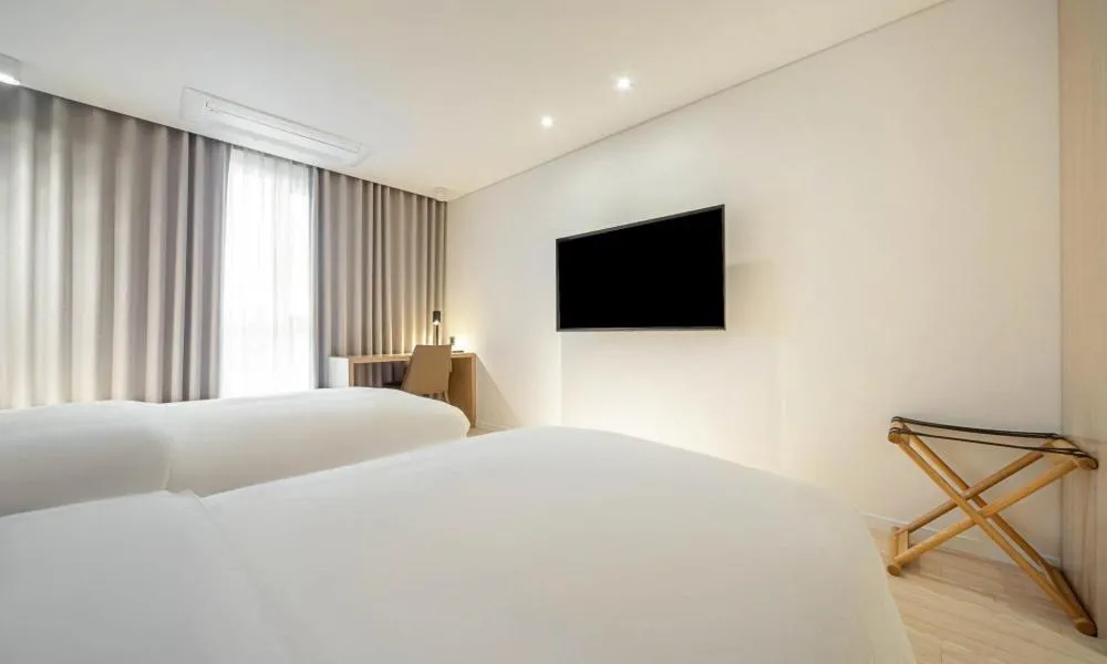 Photo of the whole room, Bed in Pohang Hotel Noblion