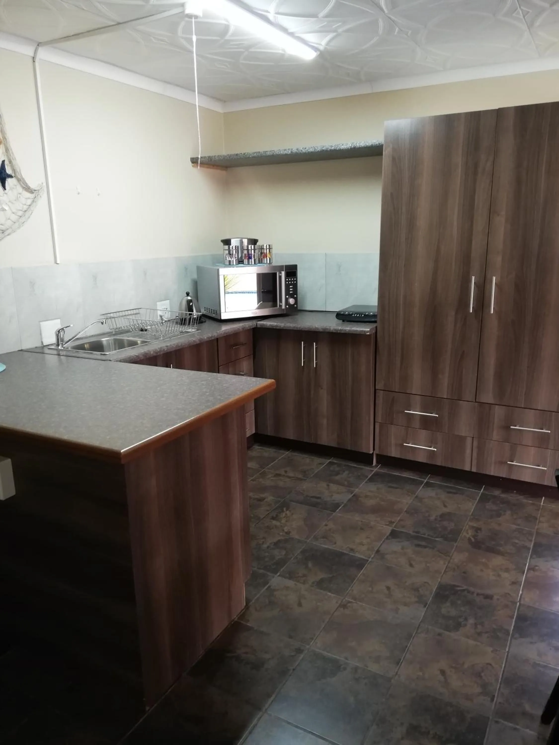 Kitchen or kitchenette in El Gran Chaparral Guest House