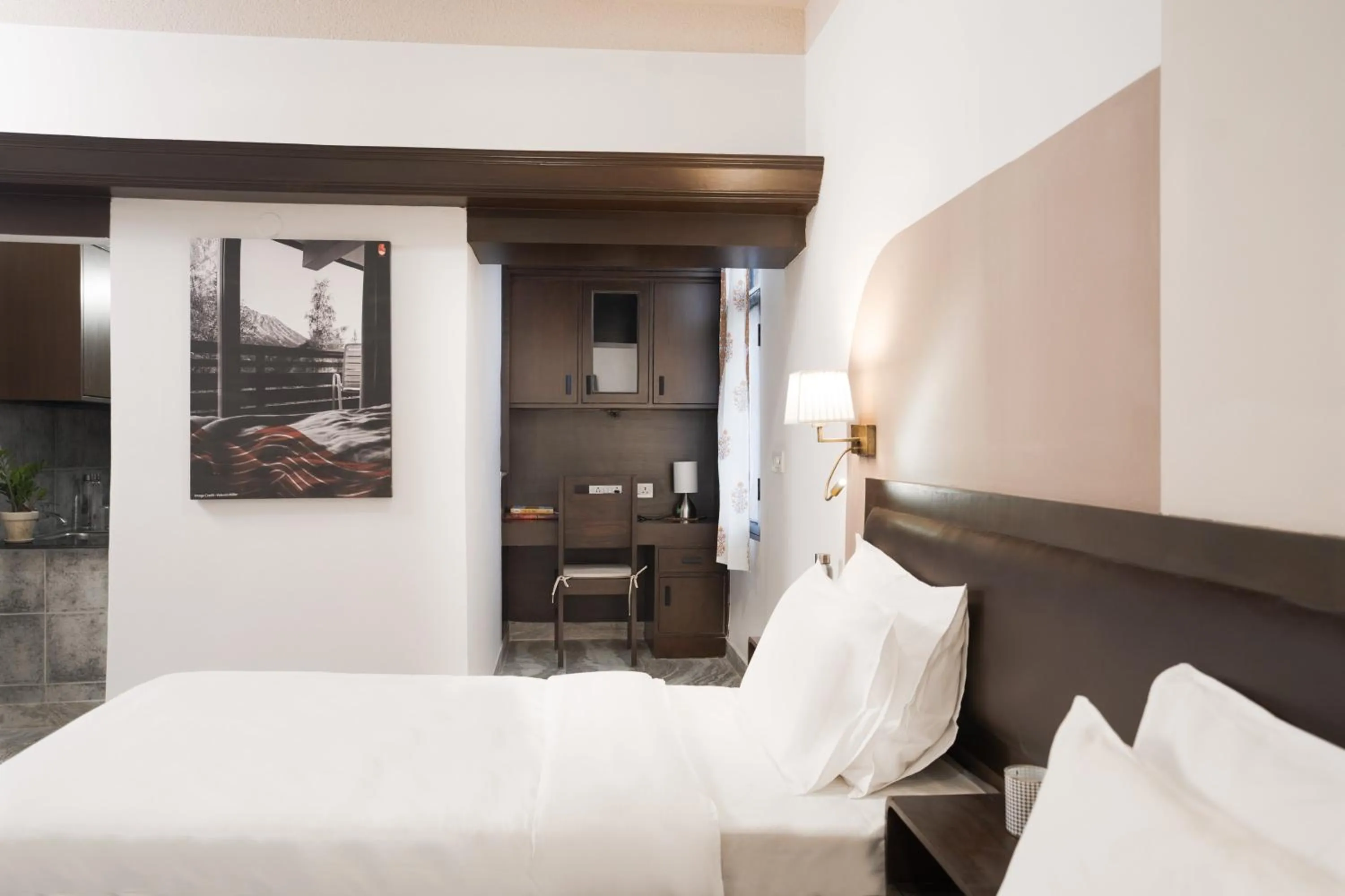 Bed in Firebrick Boutique Residences - GARNET HOUSE