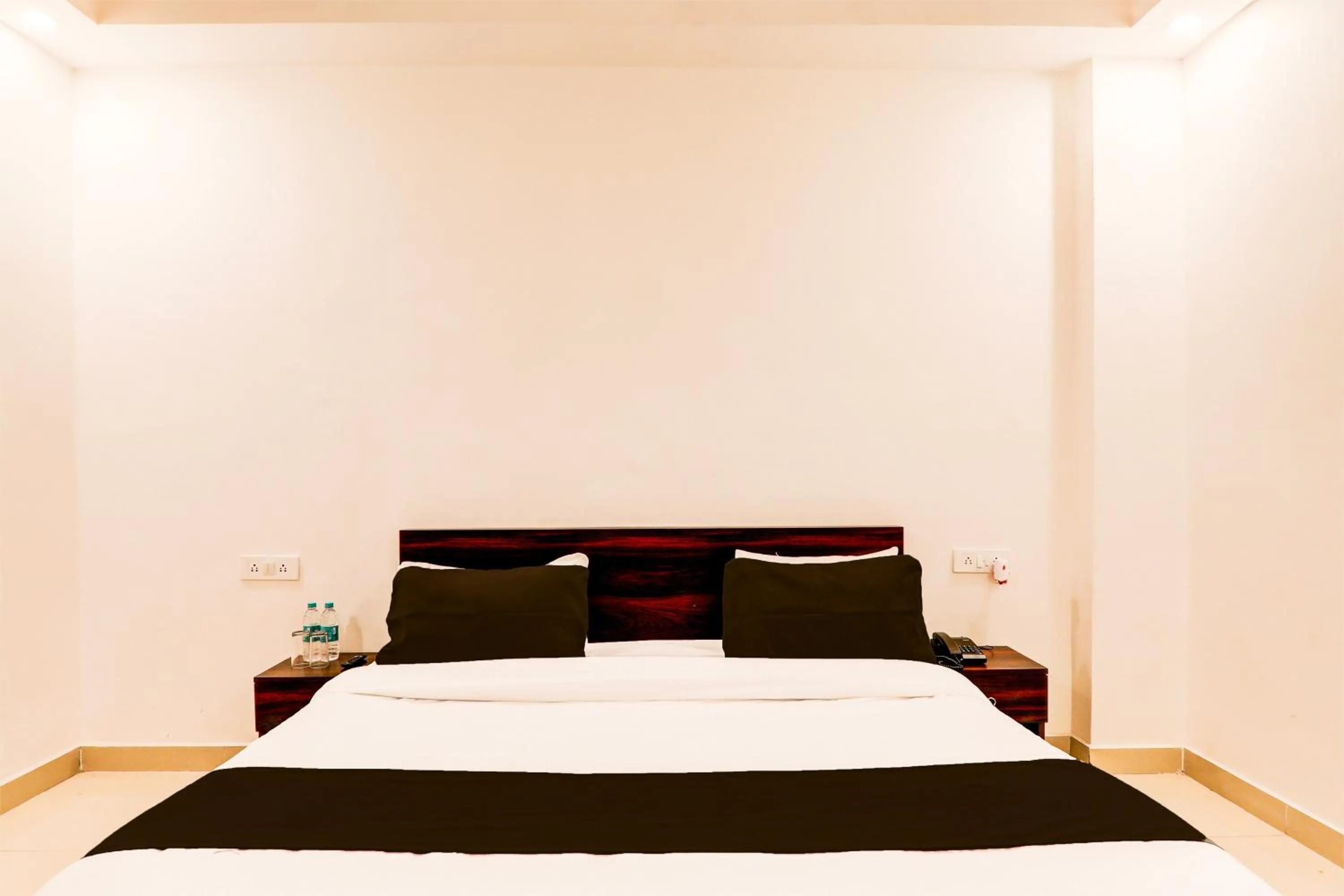 Bedroom in Hotel O The Suite