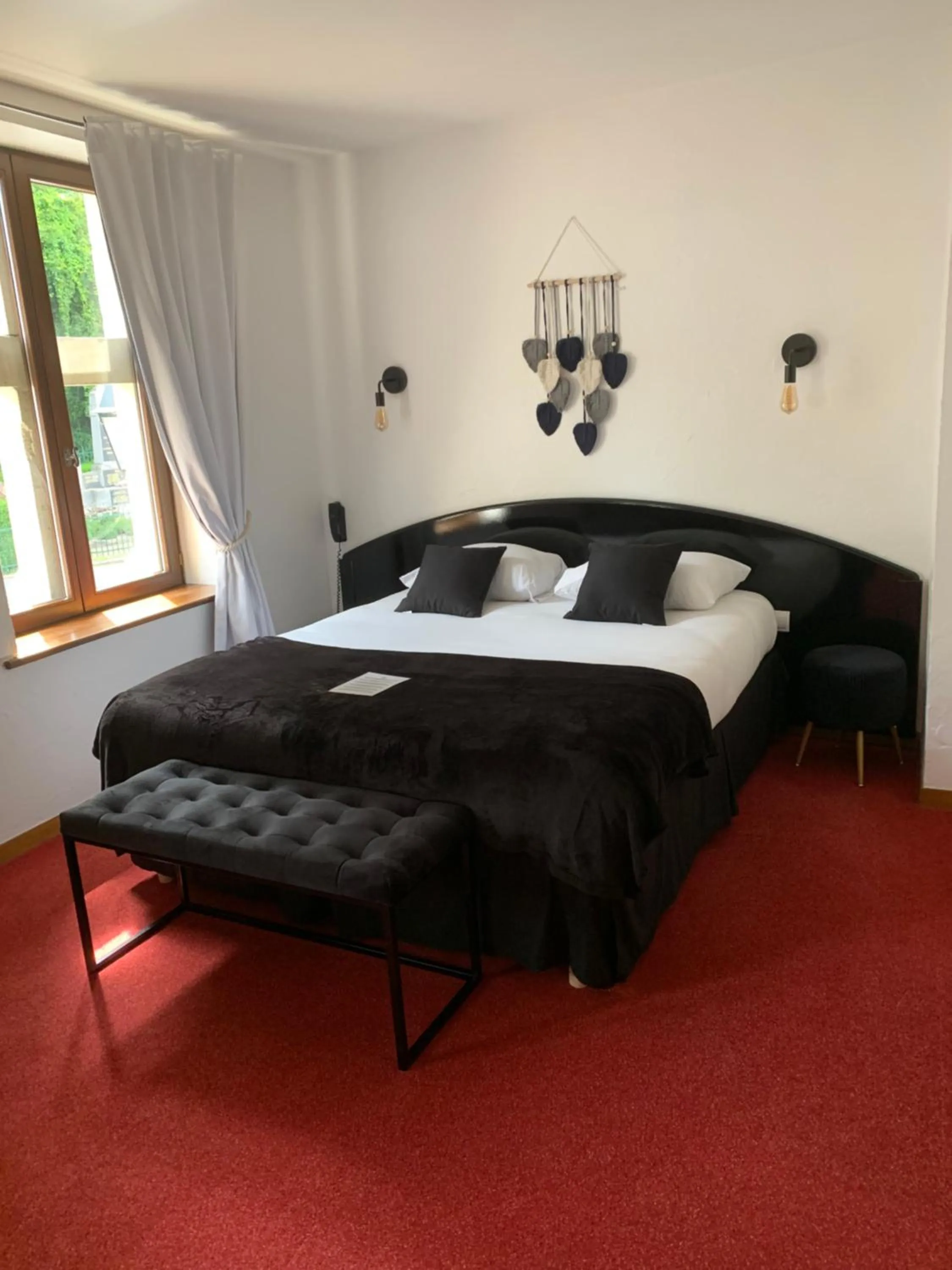 Bed in AUBERGE DU JEU D'ARC