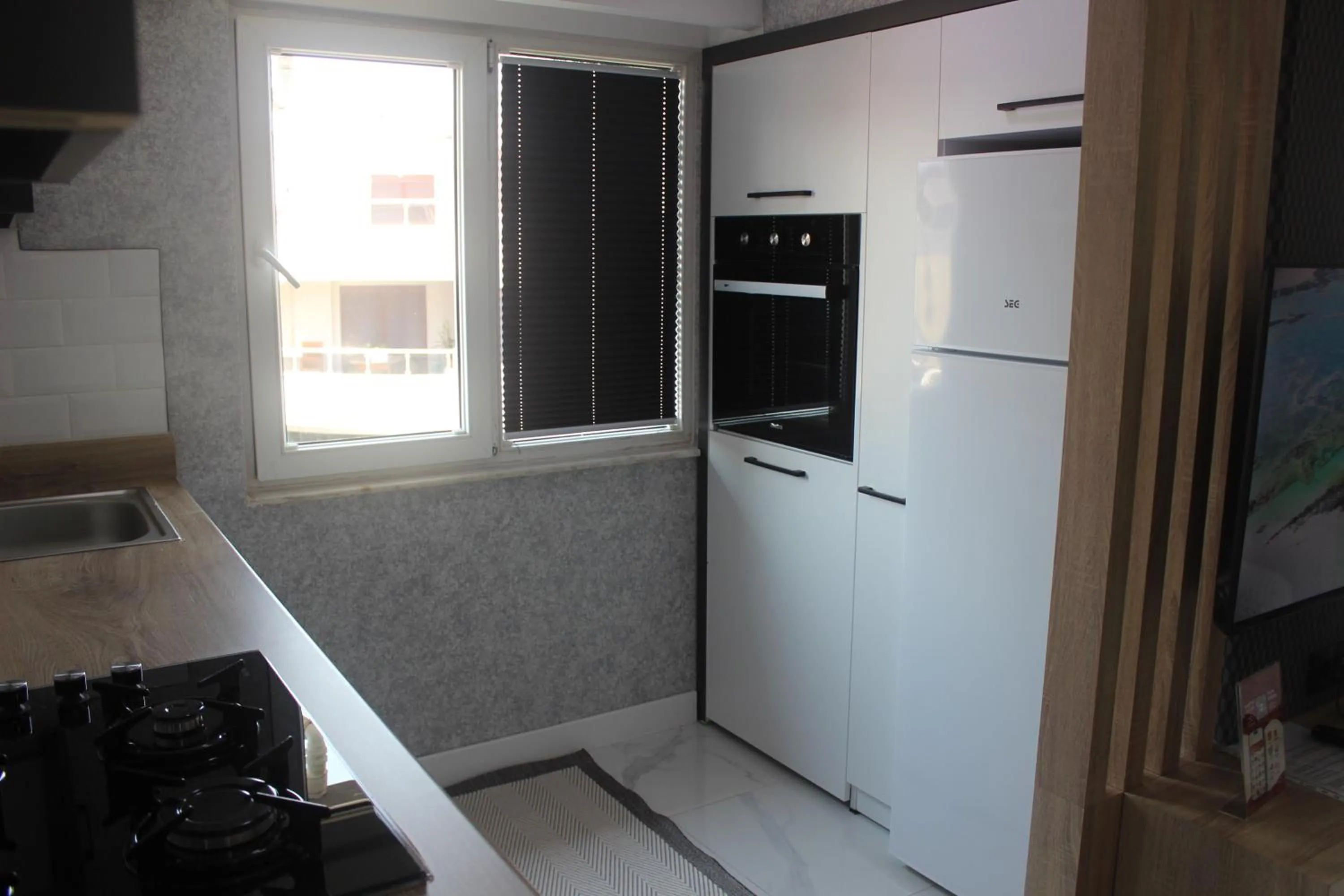 Kitchen or kitchenette in Cosy Suite