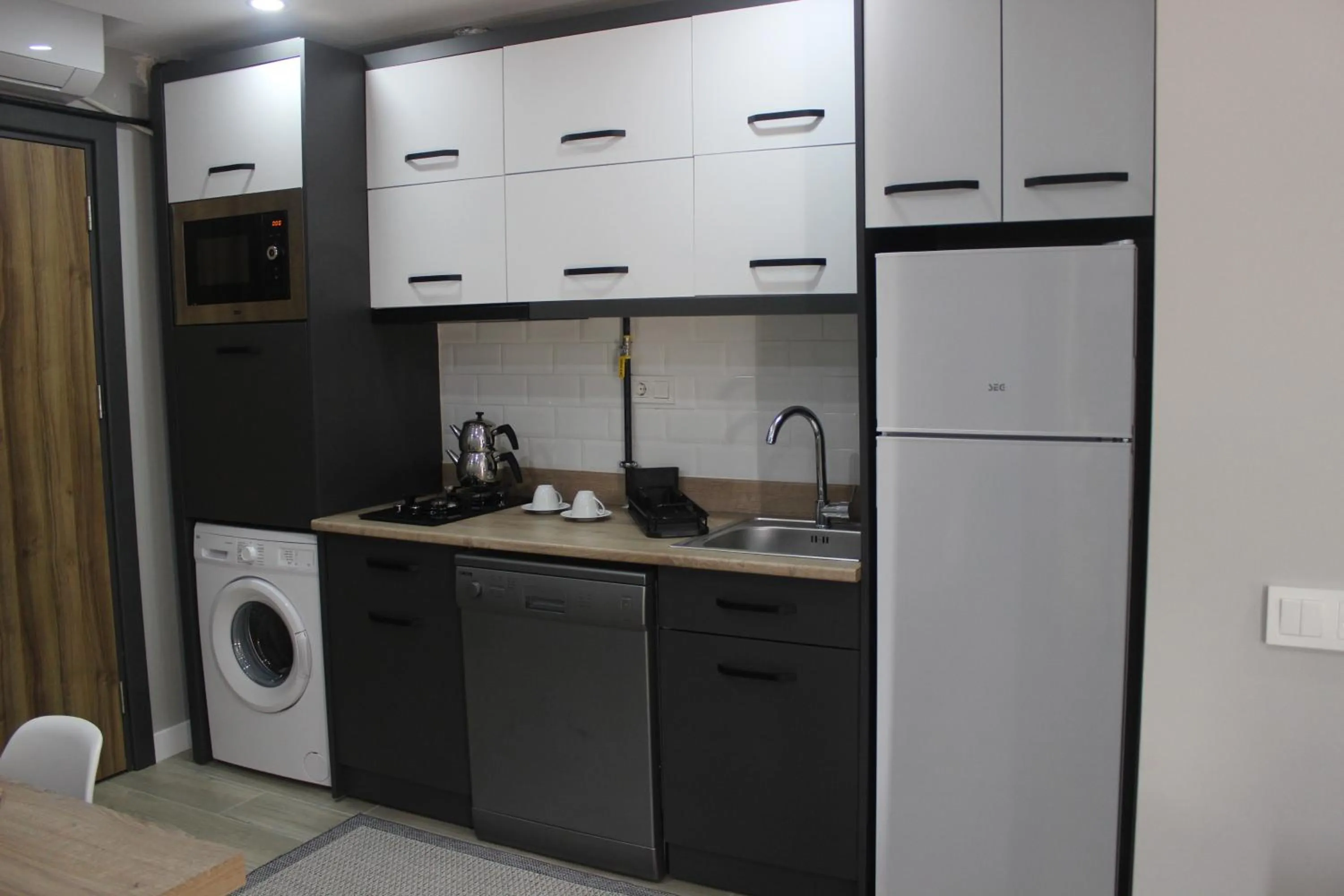 Kitchen or kitchenette in Cosy Suite