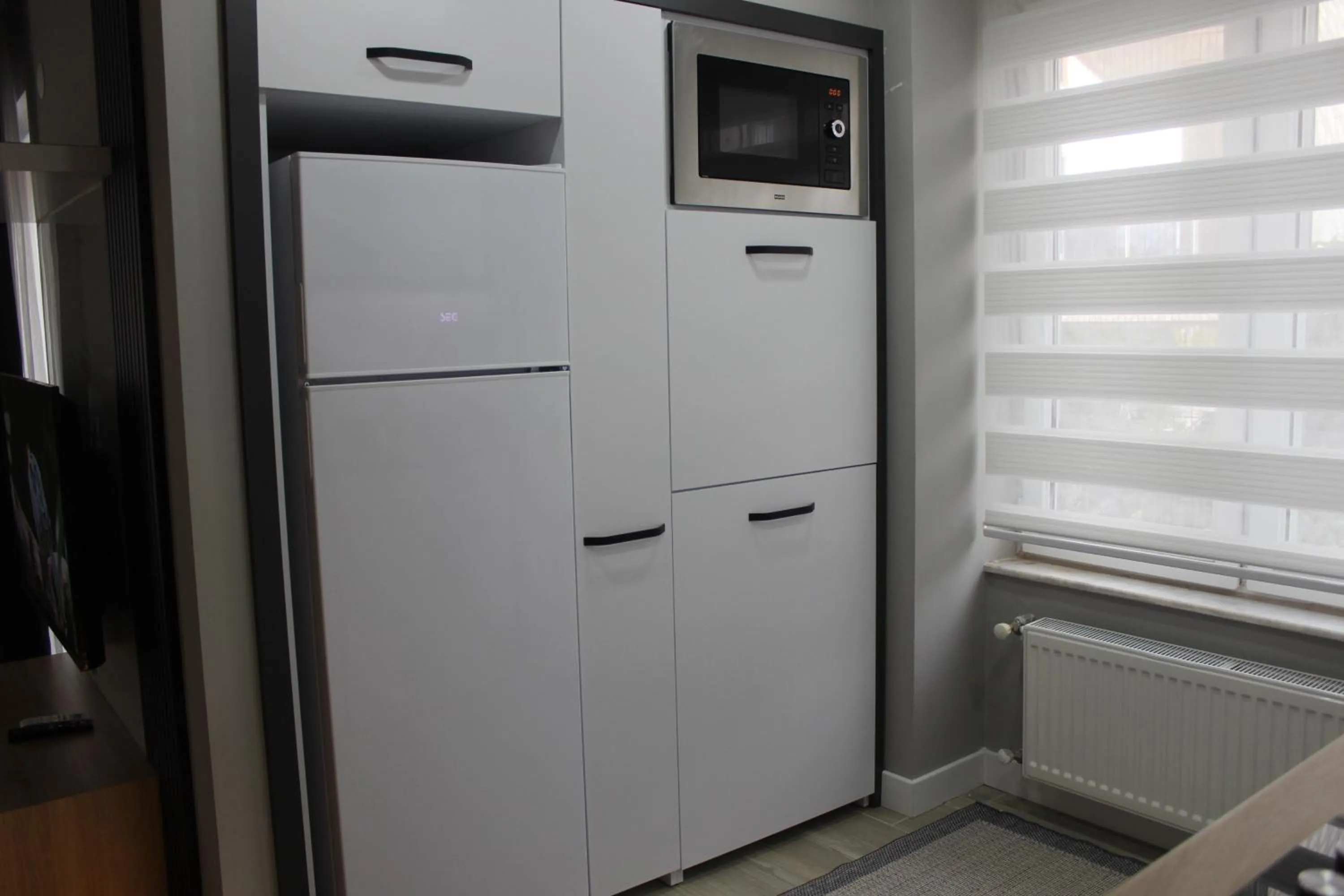 Kitchen or kitchenette in Cosy Suite