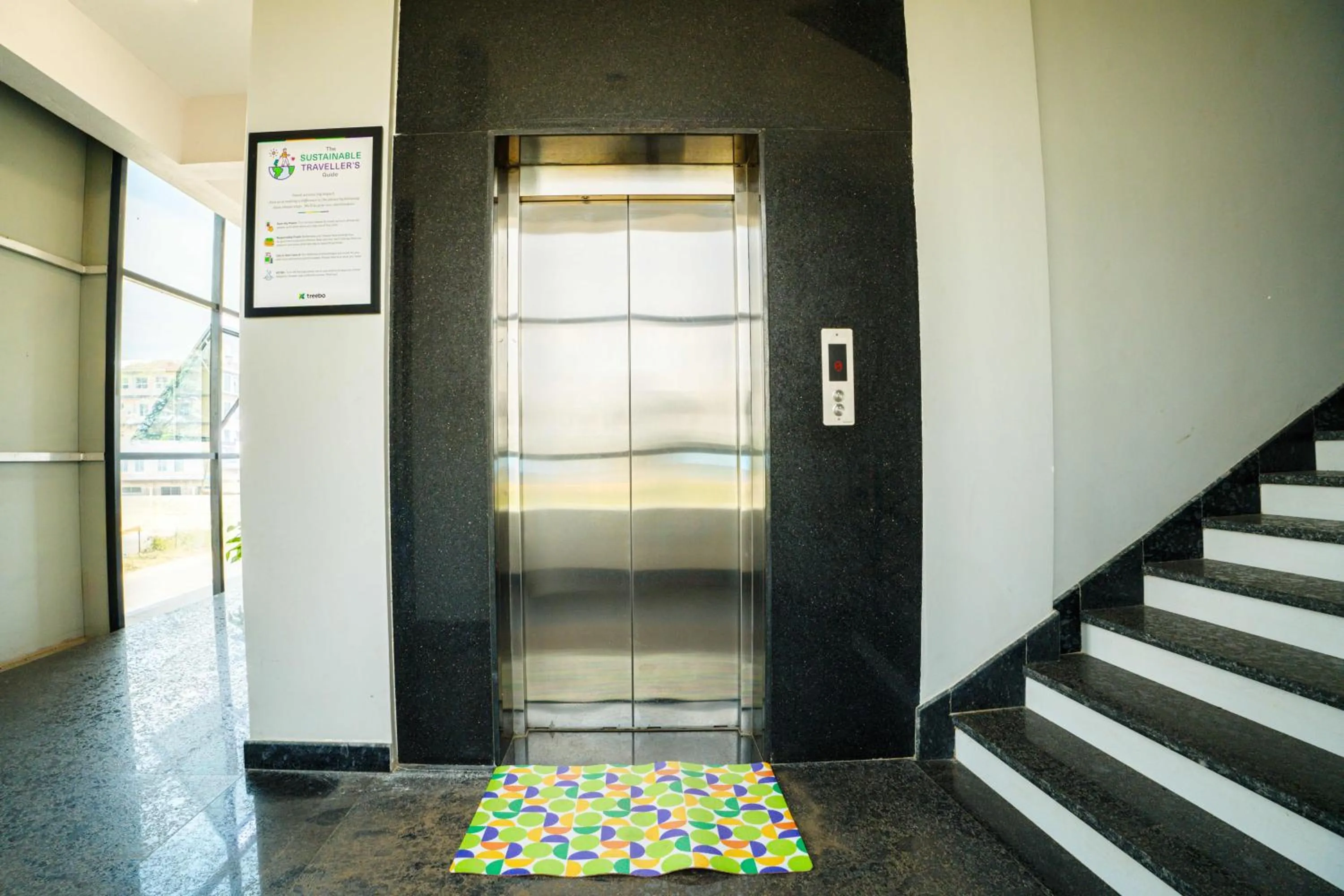 elevator in Treebo RC Comforts