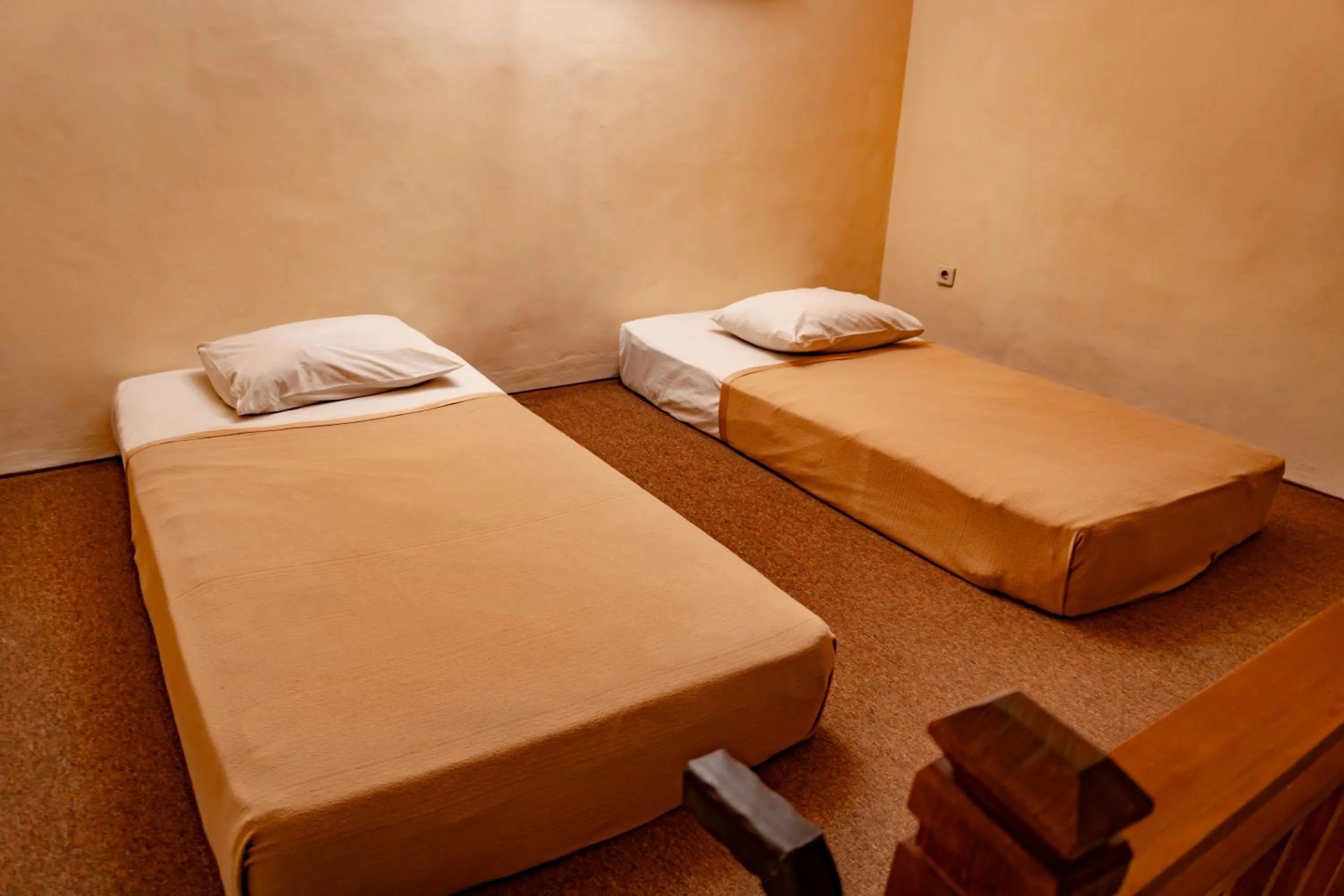 Bed in Hotel Puri Dibia Kuta