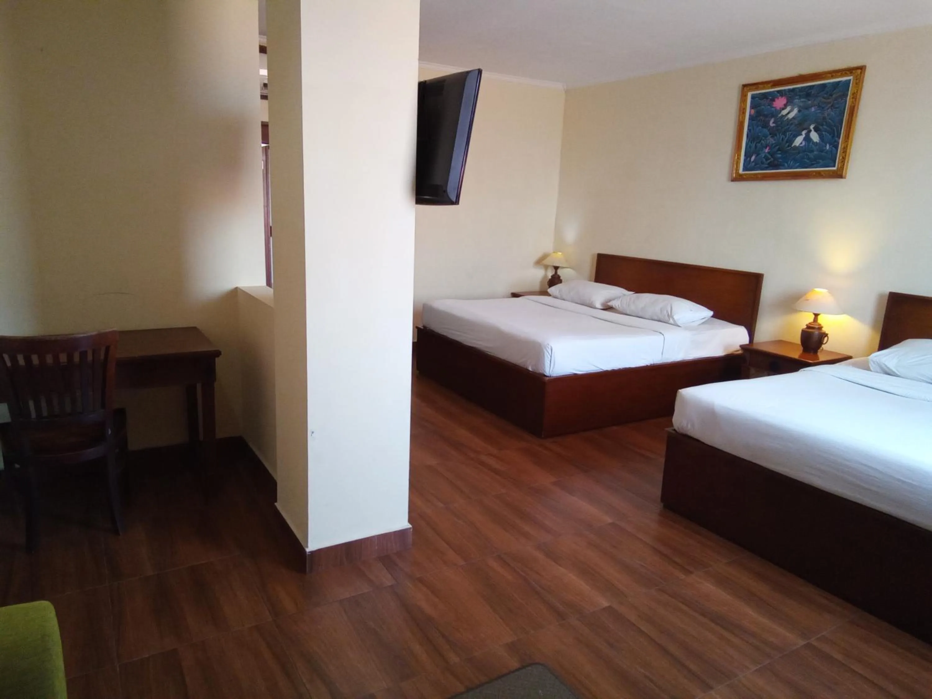 Bed in Hotel Puri Dibia Kuta