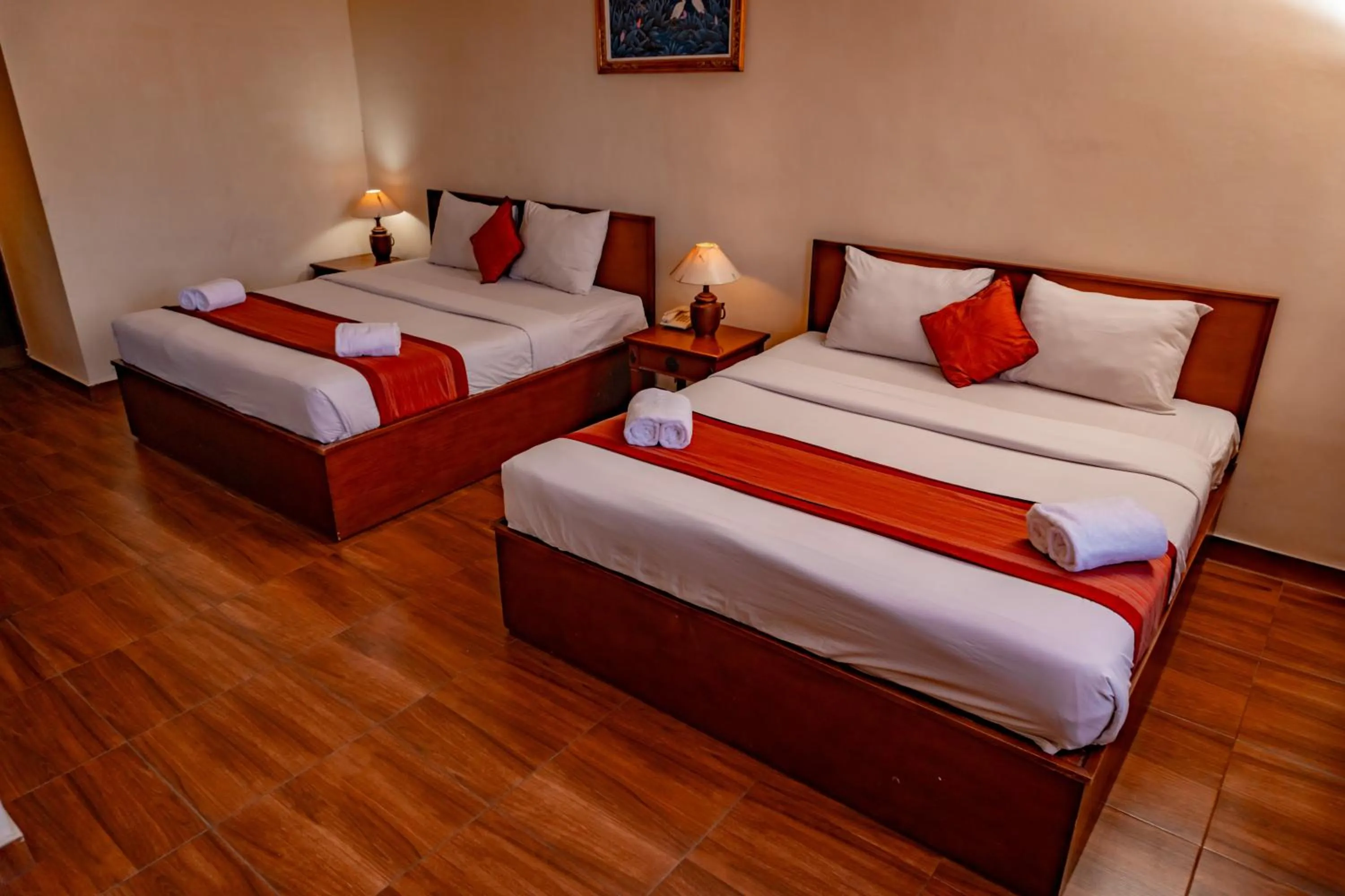 Bed in Hotel Puri Dibia Kuta