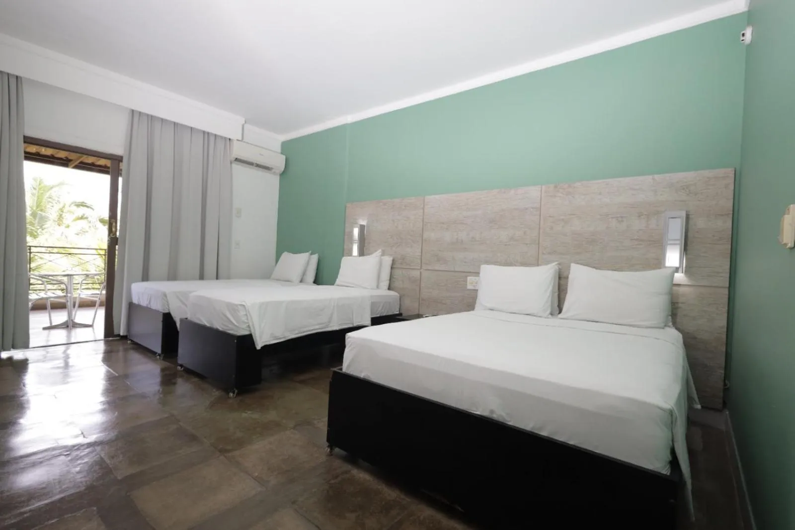 Bed in ARAGUAIA HOTEL