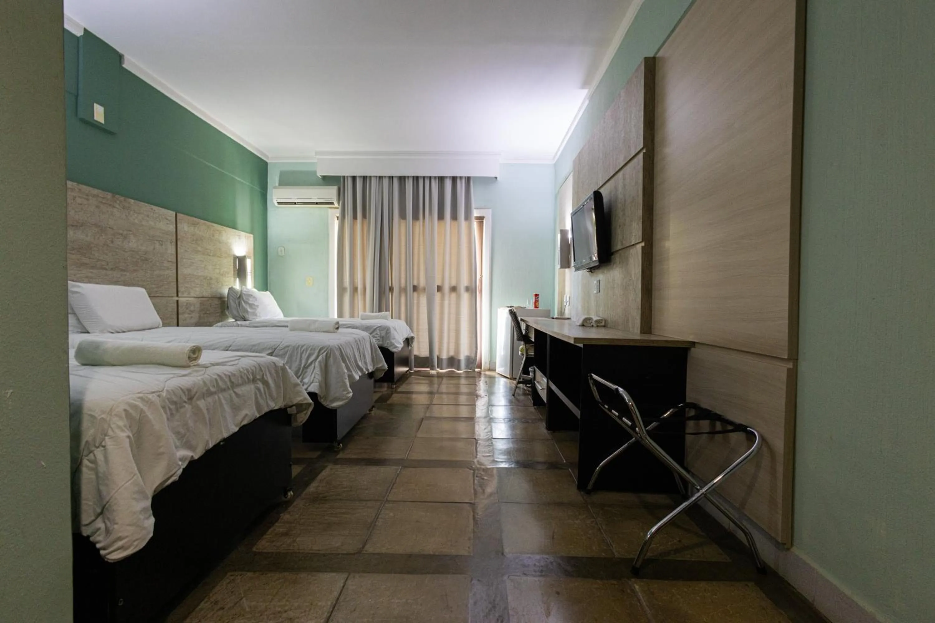 Bed in ARAGUAIA HOTEL