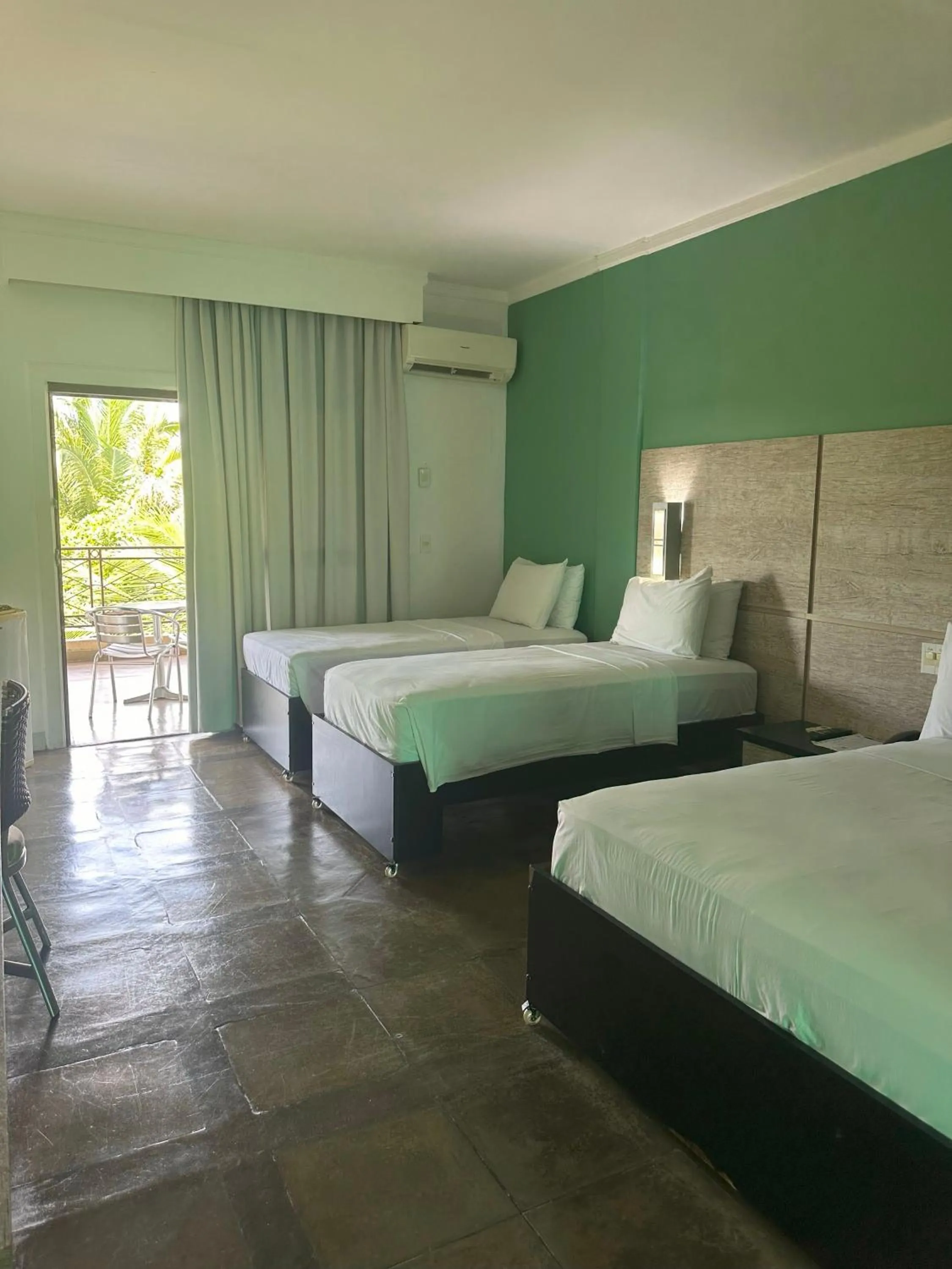 Bed in ARAGUAIA HOTEL