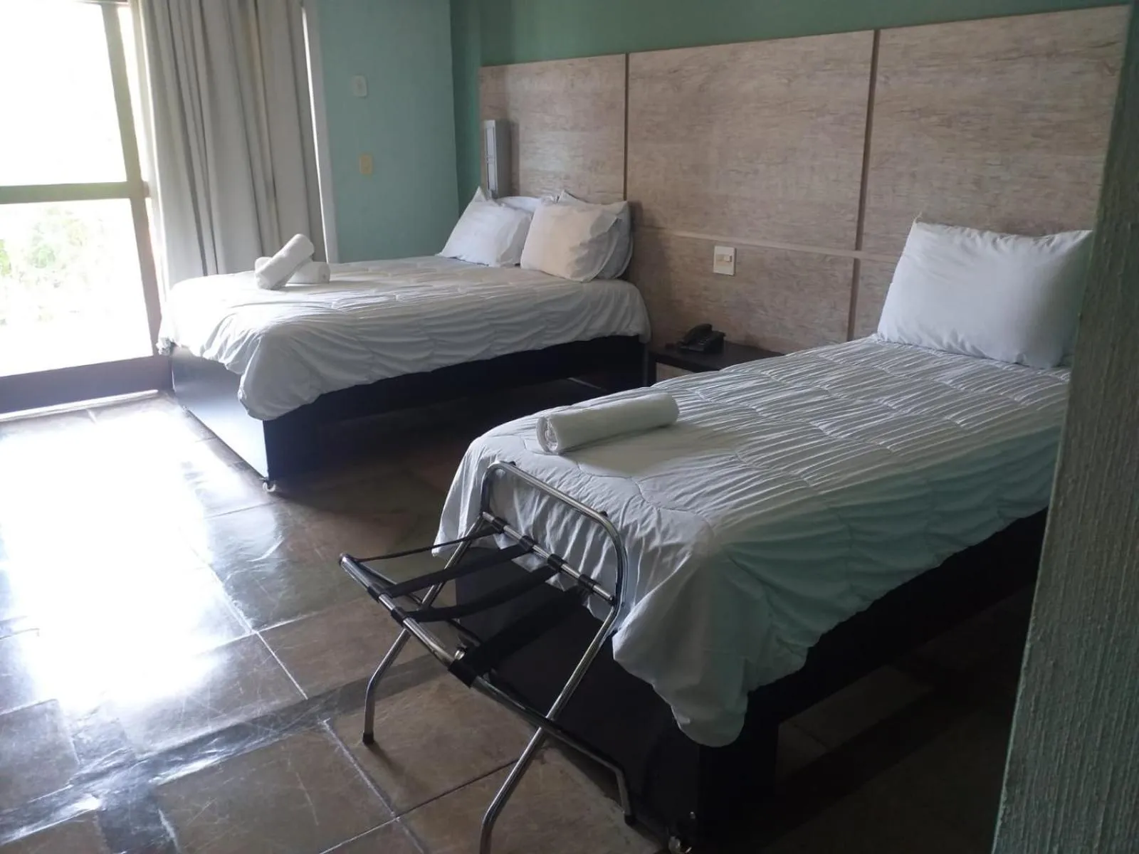 Bed in ARAGUAIA HOTEL