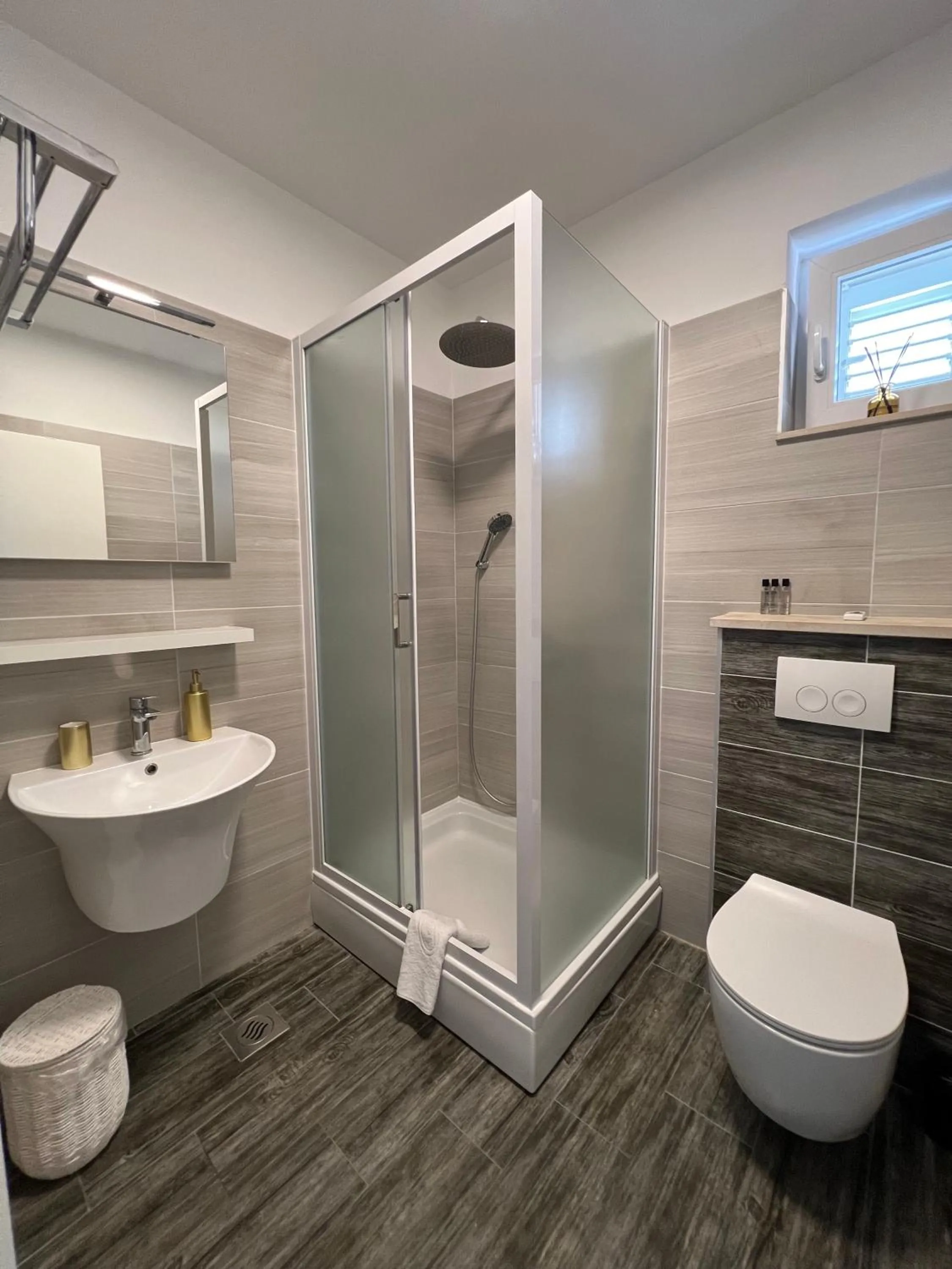 Bathroom in Apartments Domani