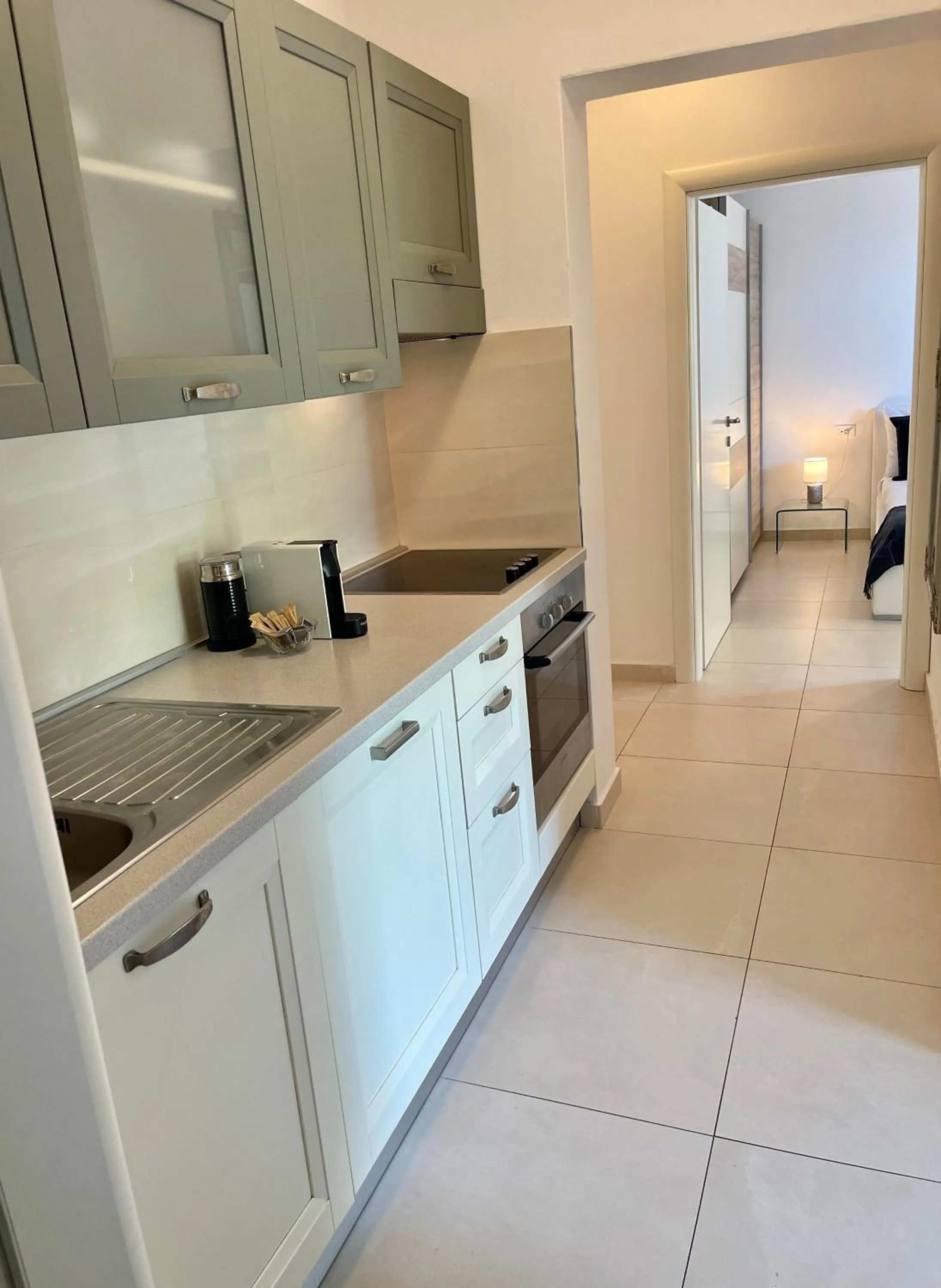 Kitchen or kitchenette in Apartments Domani