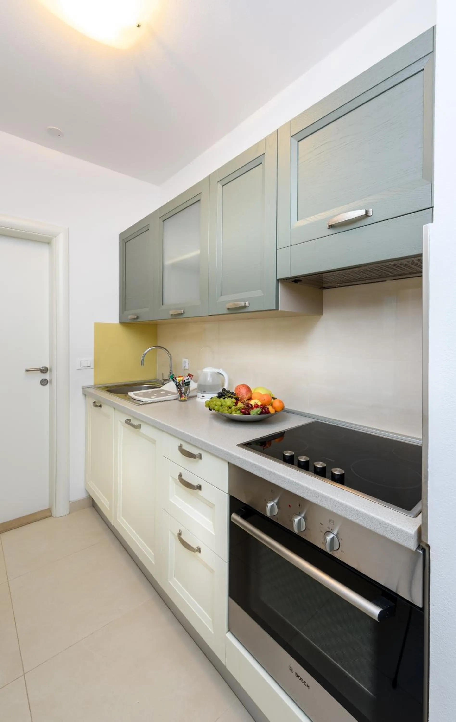 Kitchen or kitchenette in Apartments Domani