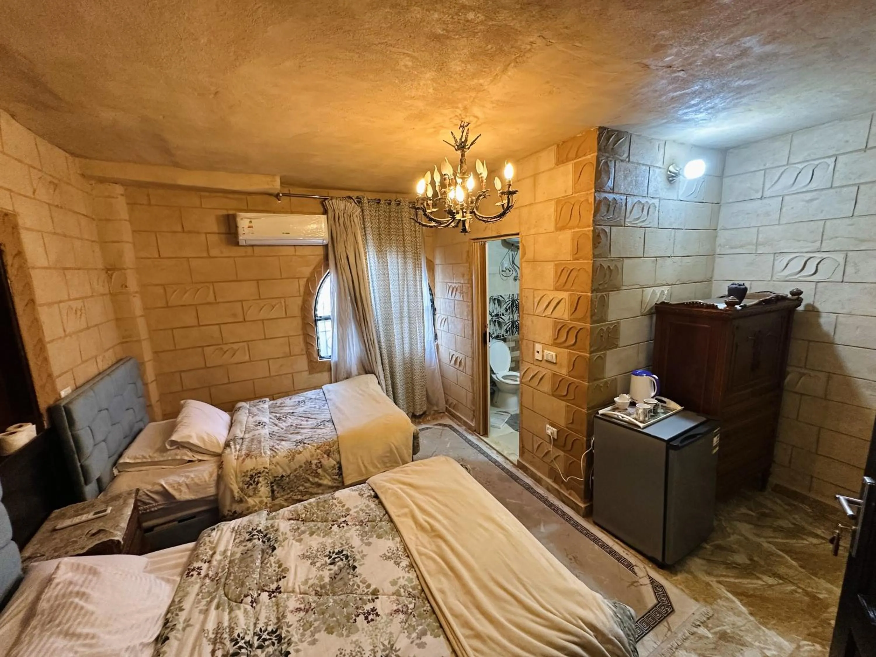 Bed in Chez l'ami hotel