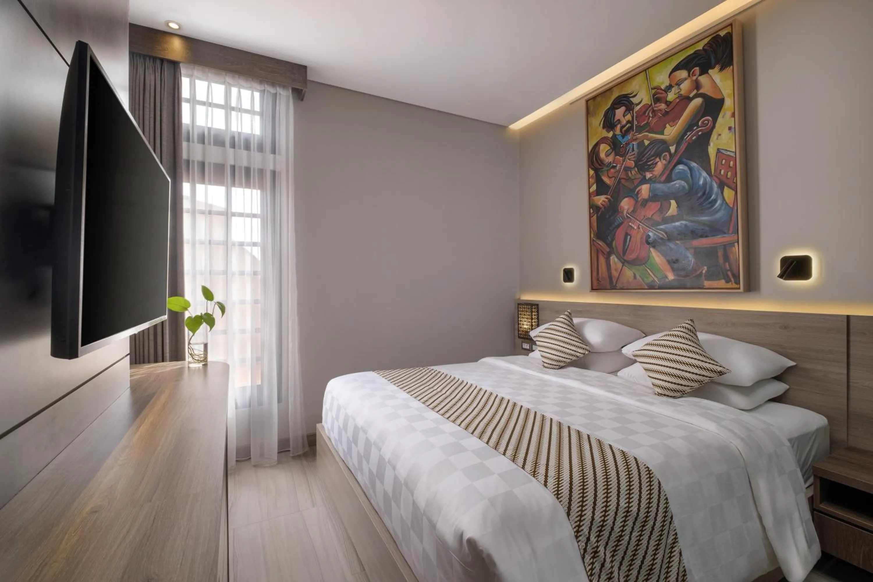 Photo of the whole room, Bed in The Margaux Hotel Yogyakarta