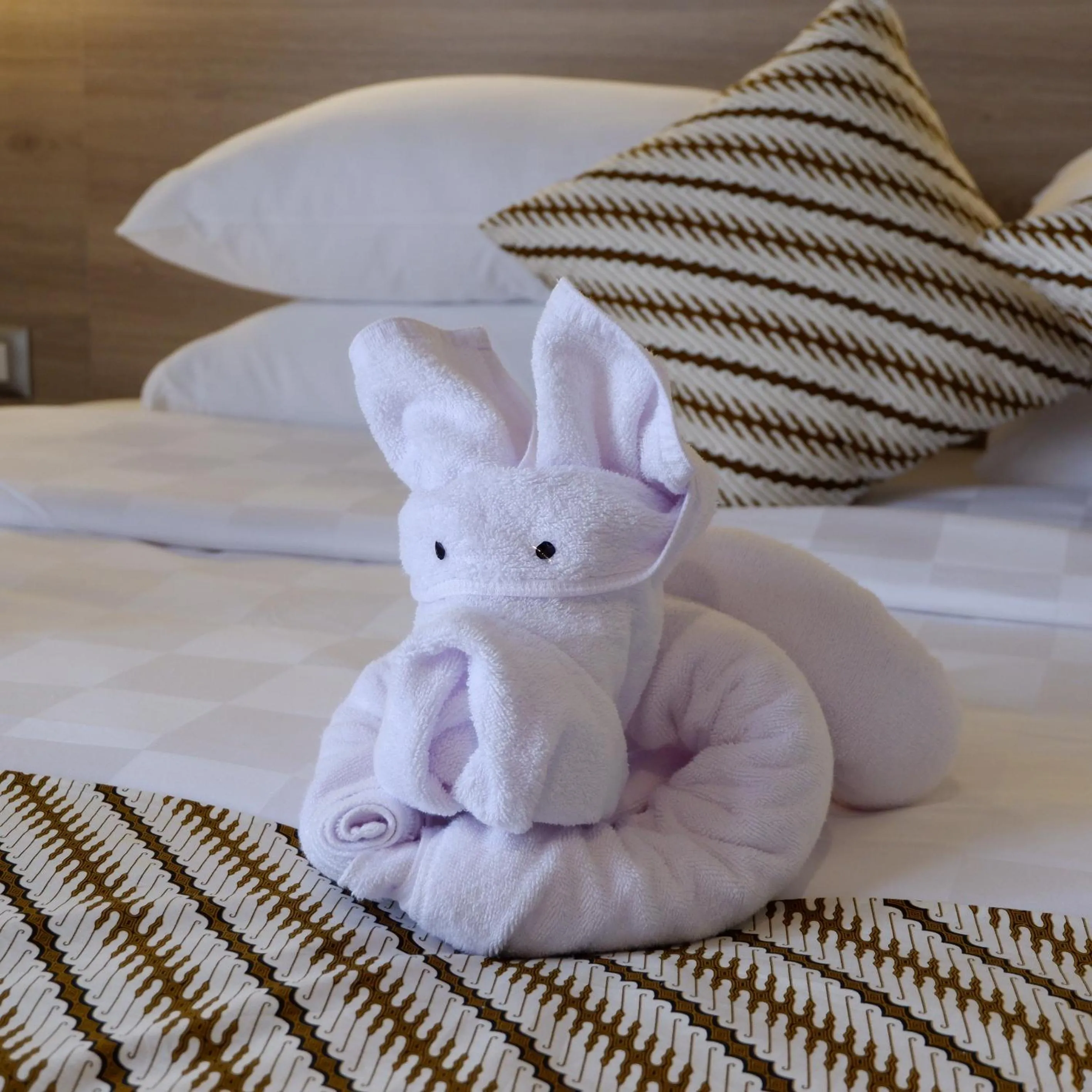 towels, Bed in The Margaux Hotel Yogyakarta